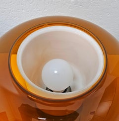 Space Age Table Lamp in Orange Glass on bright orange metal base, Italy 1970s
