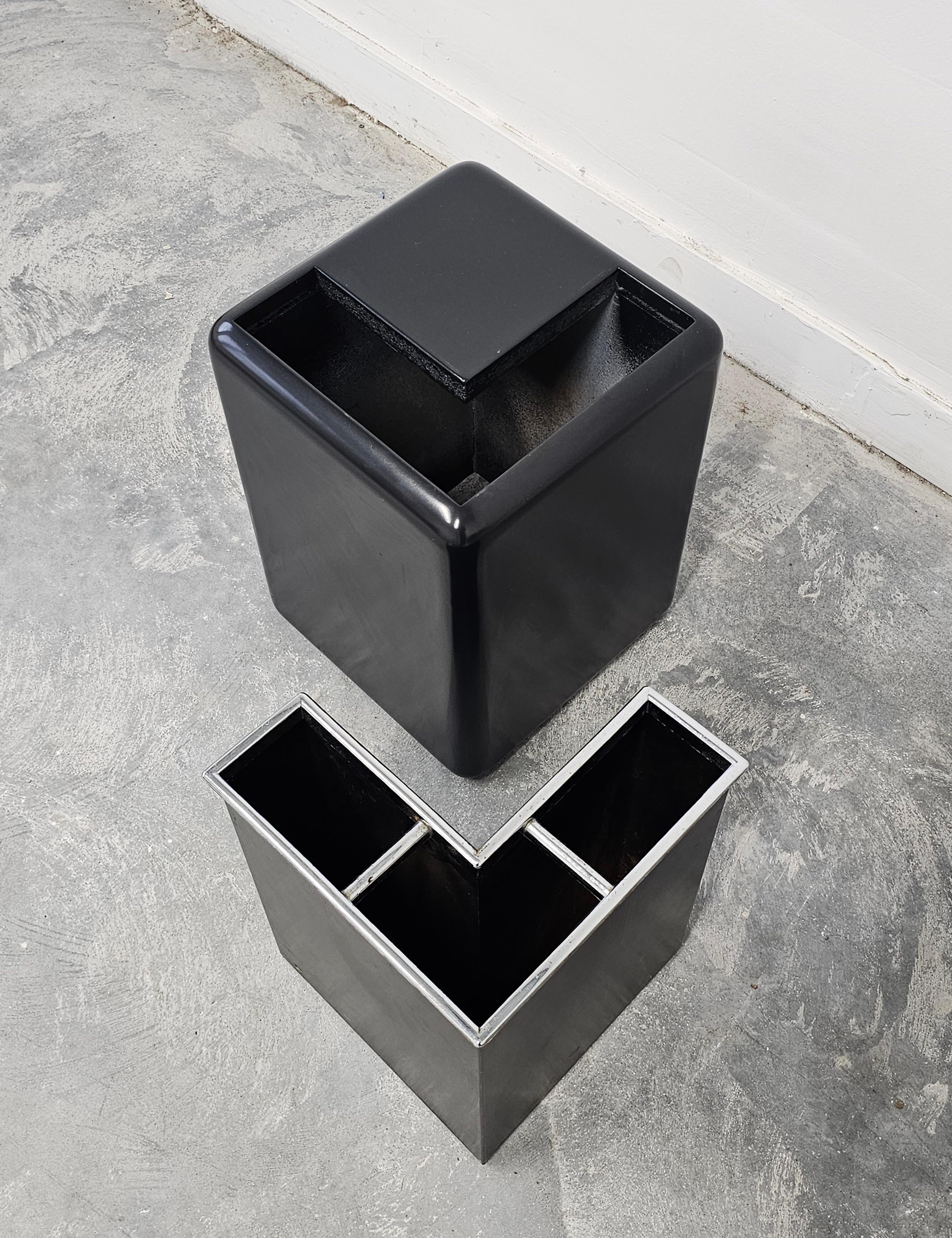 In this listing you will find a sleek Space Age umbrella stand in black wood and metal. Its simple, yet striking minimalist design will fit well in various interiors. Made in Italy in 1970s.

Very good vintage condition. Recently refurbished - the
