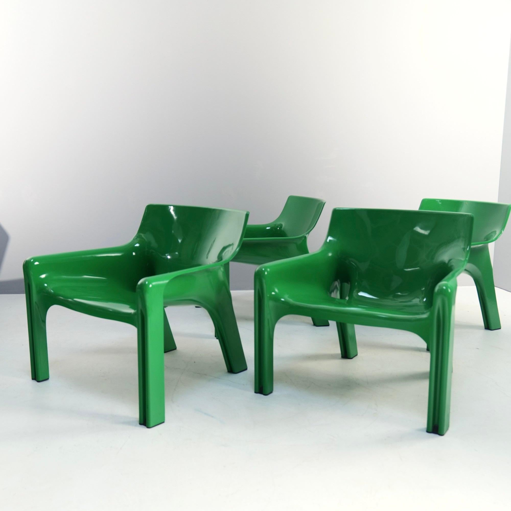 Set of 4 green armchairs designed by Vico Magistretti for Artemide.

Made in 1970's in Italy by Artemide

dimensions:
68 cm height
67 depth
78 cm width
37 cm seating height

material:
abs-plastic

condition:
Fully polished . Very good condition with