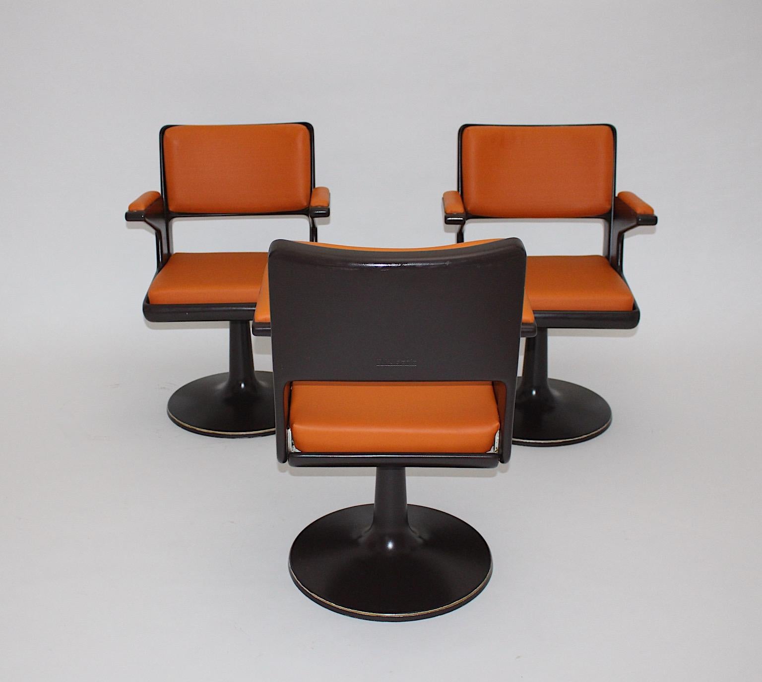 German Space Age Vintage Brown Plastic Orange Faux Leather Swivel Armchairs 1970s For Sale