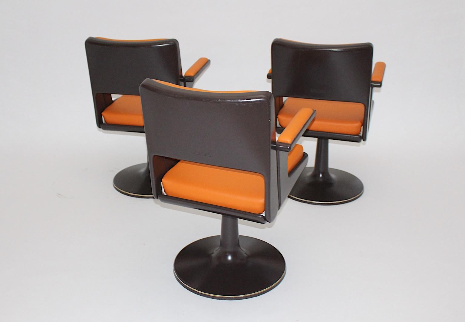 Space Age Vintage Brown Plastic Orange Faux Leather Swivel Armchairs 1970s For Sale 2