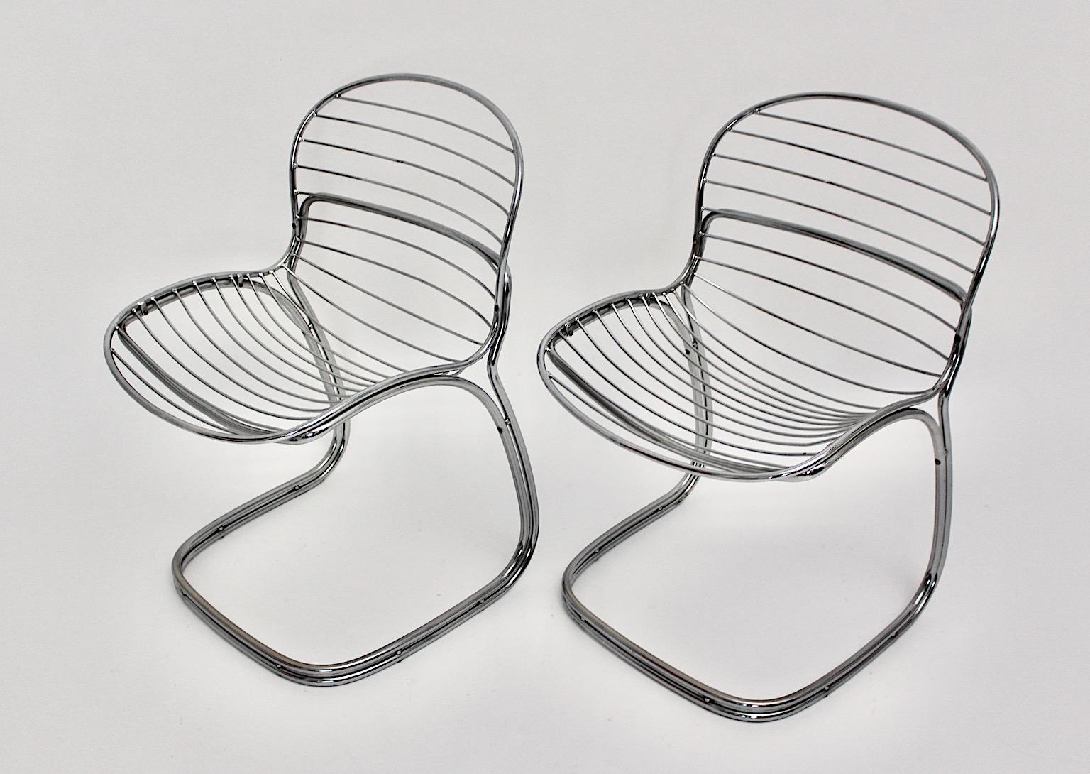 Space Age pair of vintage chairs from chromed tube steel model Sabrina for Rima, Italy, 1970s.
Slightly curved chromed tube steel floats from the seat and back into the base.
The design from the 1970s promises coolness and timeless. These chairs
