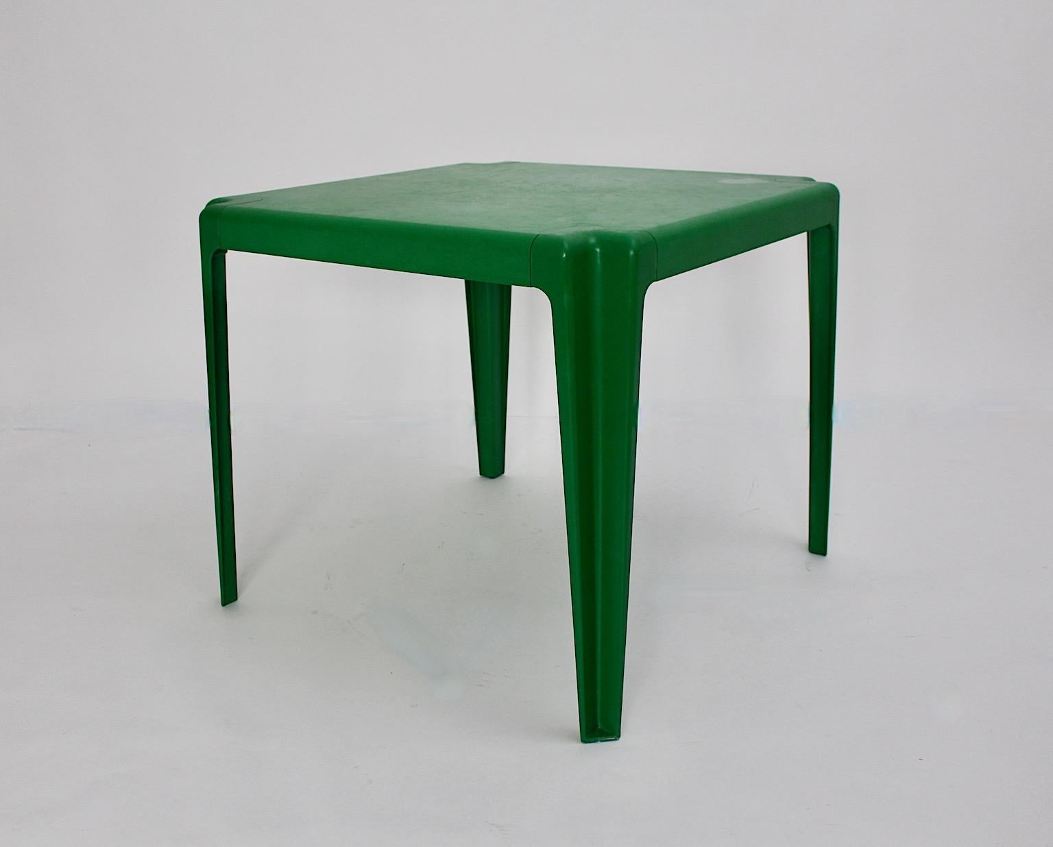 green plastic outdoor table