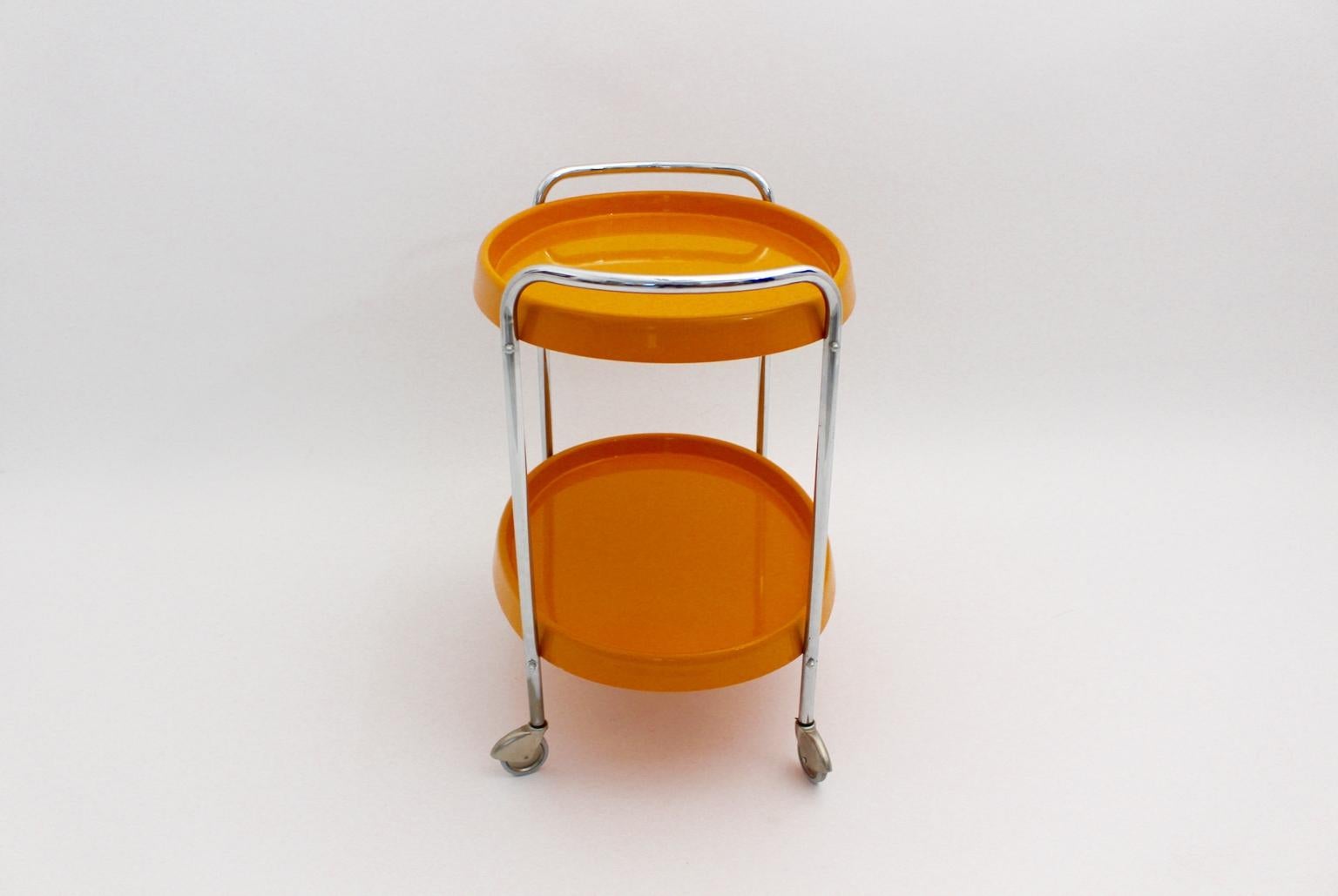 Space Age Vintage Orange Plastic Chromed Bar Cart, 1960s In Good Condition For Sale In Vienna, AT