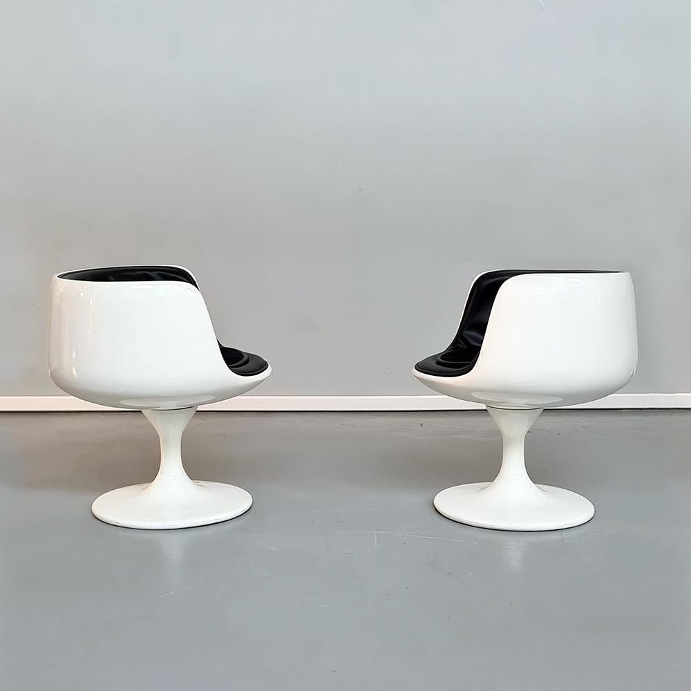 Space age white plastic and black vinyl chairs by Eero Aarnio, 1970s
A pair of Eero Aarnio chairs in Space Age style, with white plastic shell and black vinyl covering.
Comfortable, particular but suitable for many environments, they show some