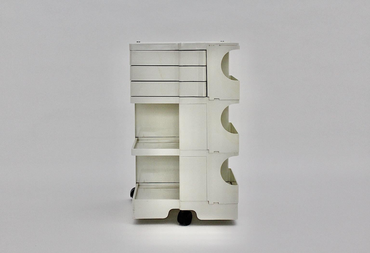 Space Age vintage storage trolley container boy from plastic in white color by
Joe Colombo for Bieffeplast 1970s Italy.
Iconic white vintage plastic storage container with wheels model boy with many revolved shelves for an easy storage.
Labeled
