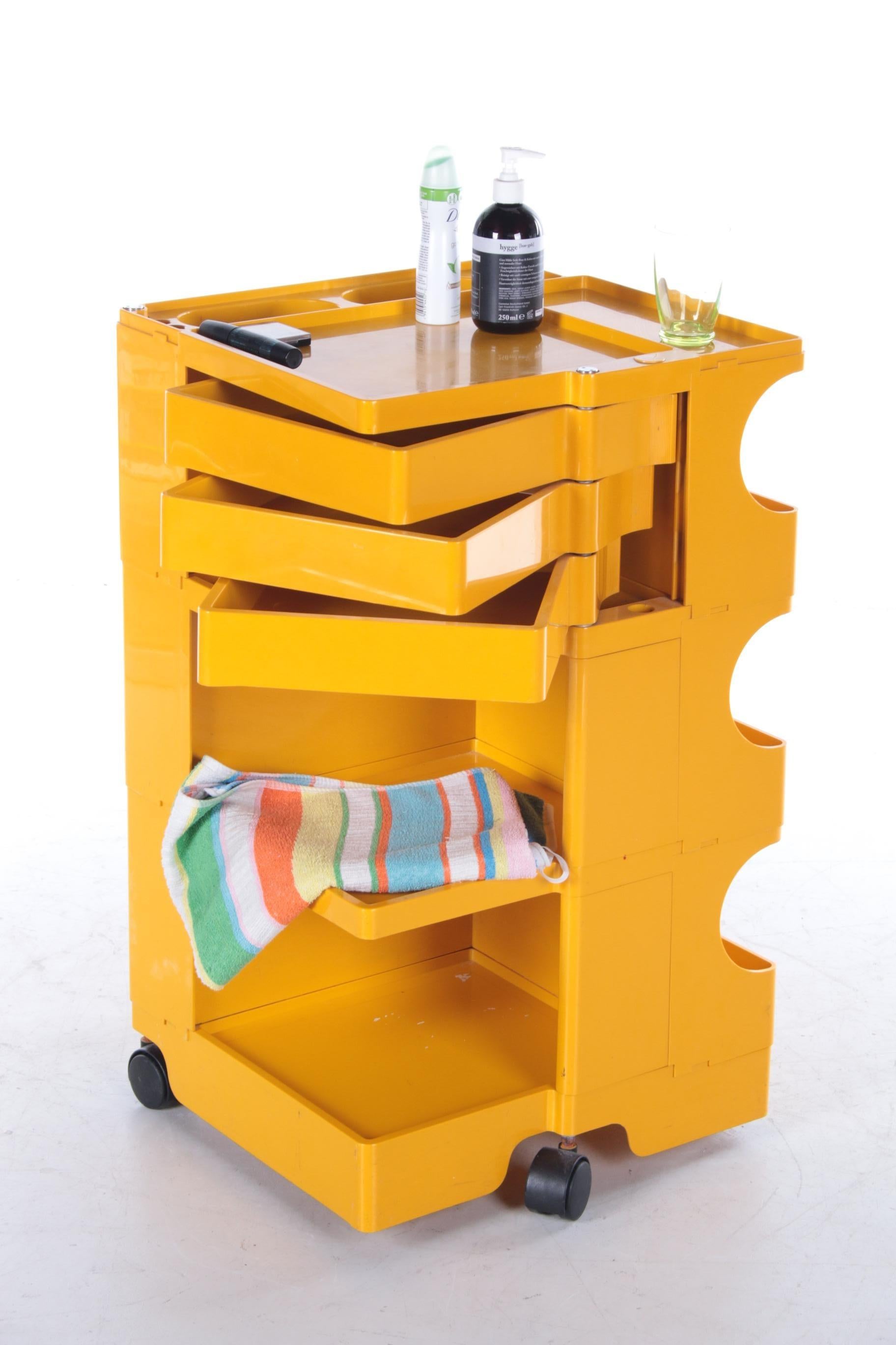 Space Age yellow Joe Colombo 'Boby' storage trolley, 1970s


This unique bright yellow 'Boby' trolley from Joe Colombo will be a real eye-catcher in your interior. The trolley was produced by Bieffeplast around the 1970s.

Joe Colombo is known