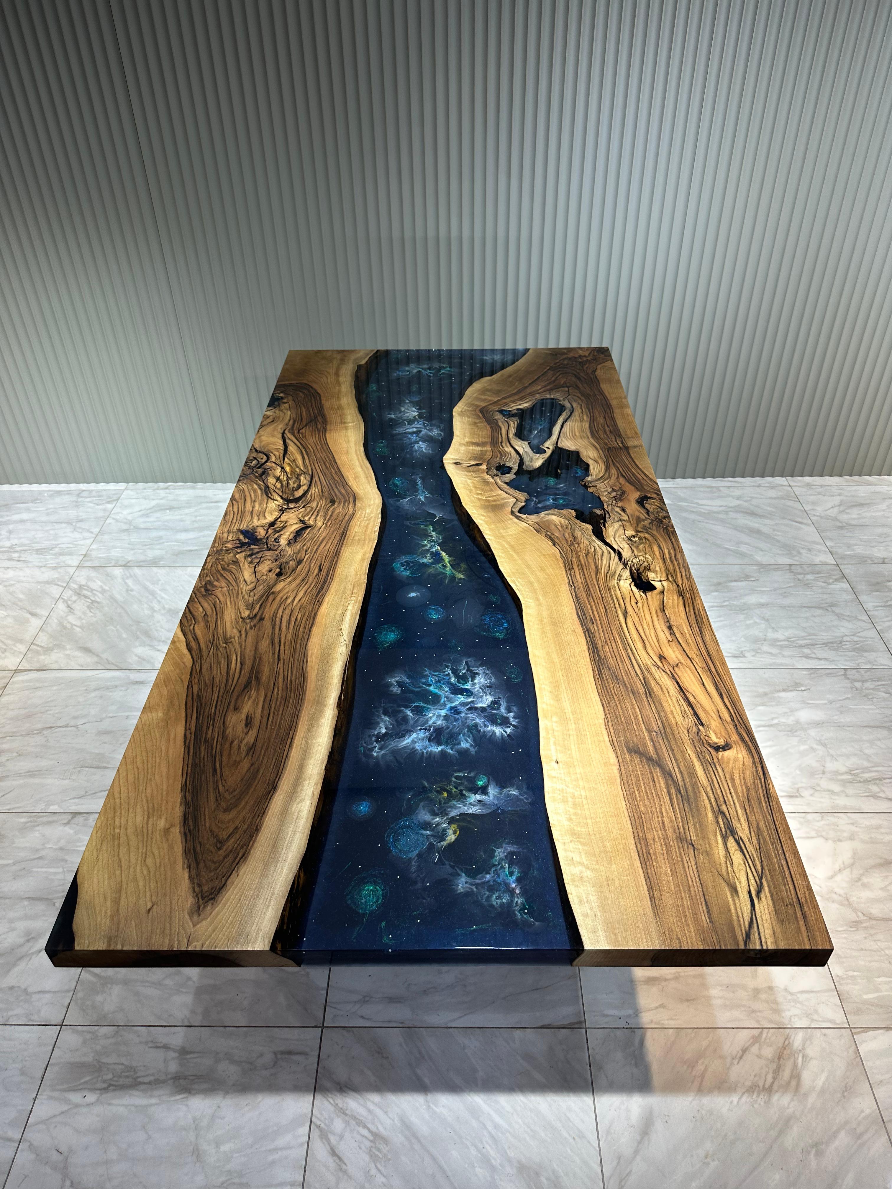Space Effect Epoxy Resin River Table

Inspired by space, this unique table is made of 500 years old walnut wood. 
We can make this table in any size you wish! 

Custom colours, and finishes are available. 

All woods have its own natural textures.