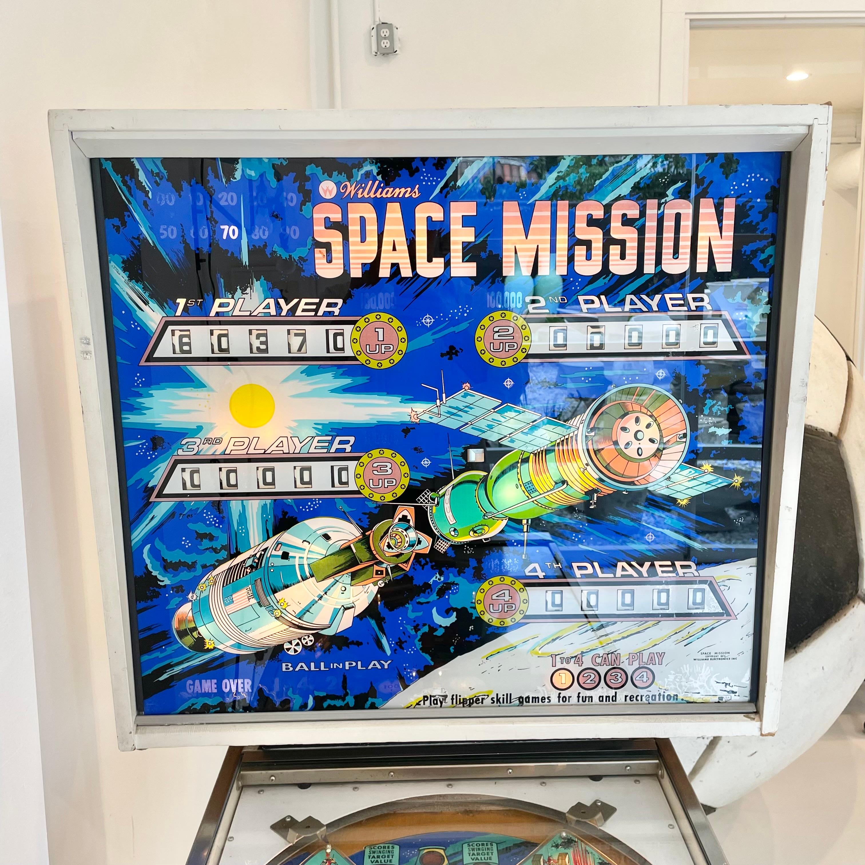 Vintage 'SPACE MISSION' pinball machine from 1976. 4 players can play. Made by Williams Electronics. In excellent working condition. Great visuals and sounds. Extremely fun paced gameplay. This game features kick out holes, moving target, swinging