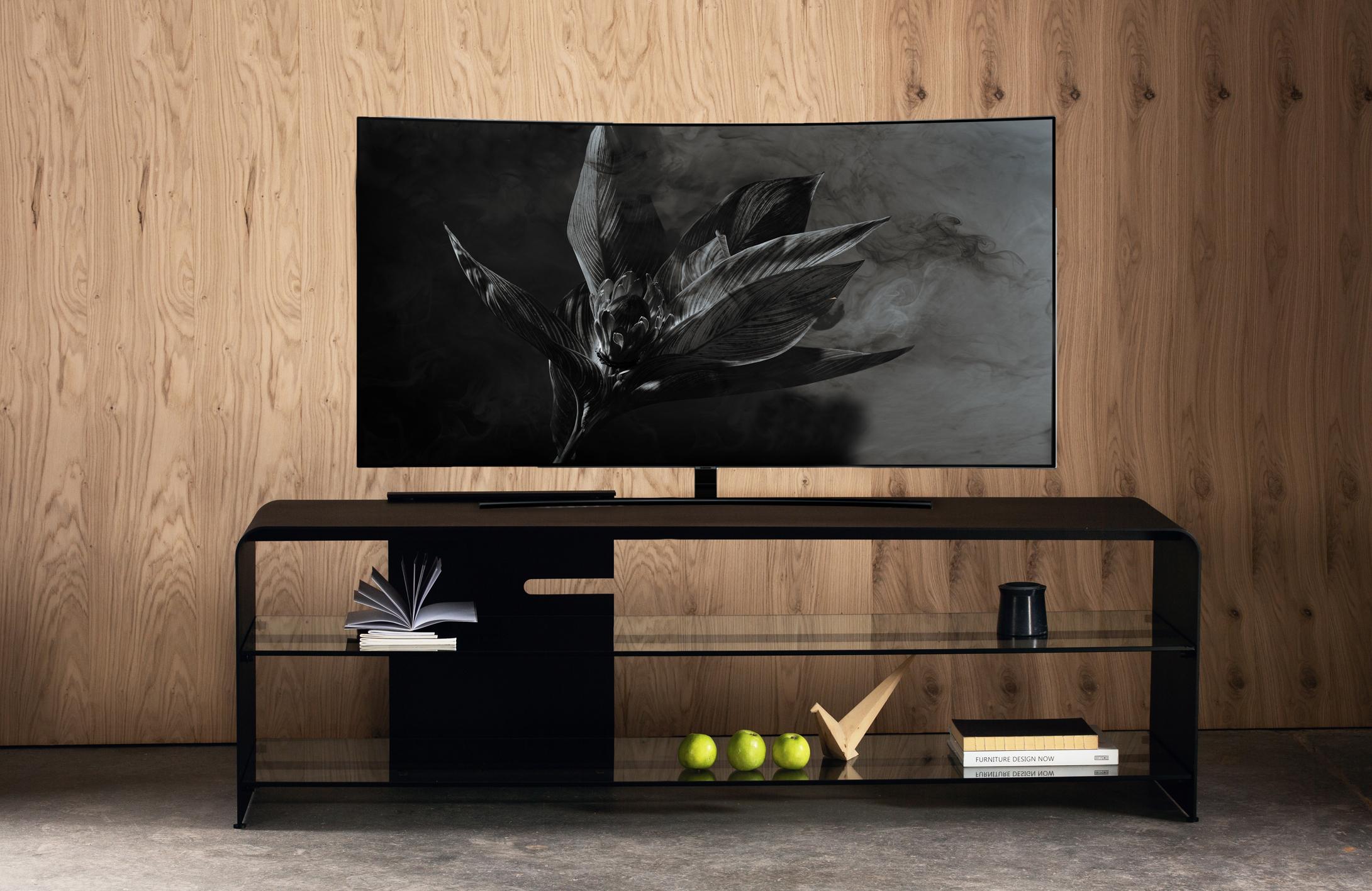 Space Up TV unit by Rectangle Studio
Dimensions: W 180 x D 45 x H 55 cm
Materials: Tempered glass, black powder over metal

SPACE UP TV Unit, based on void concept in home, office, hotel etc. reinterprets the areas of use with glass and metal