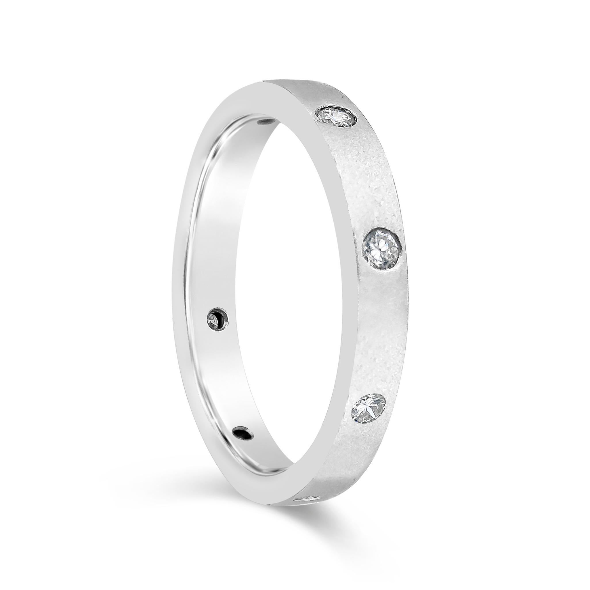 Showcasing an angular wedding band made in 18 karat white gold, flush set with equally-spaced round brilliant diamonds, weighing 0.28 carats total. Matte finish. Size 8 US.

Roman Malakov is a custom house, specializing in creating anything you can