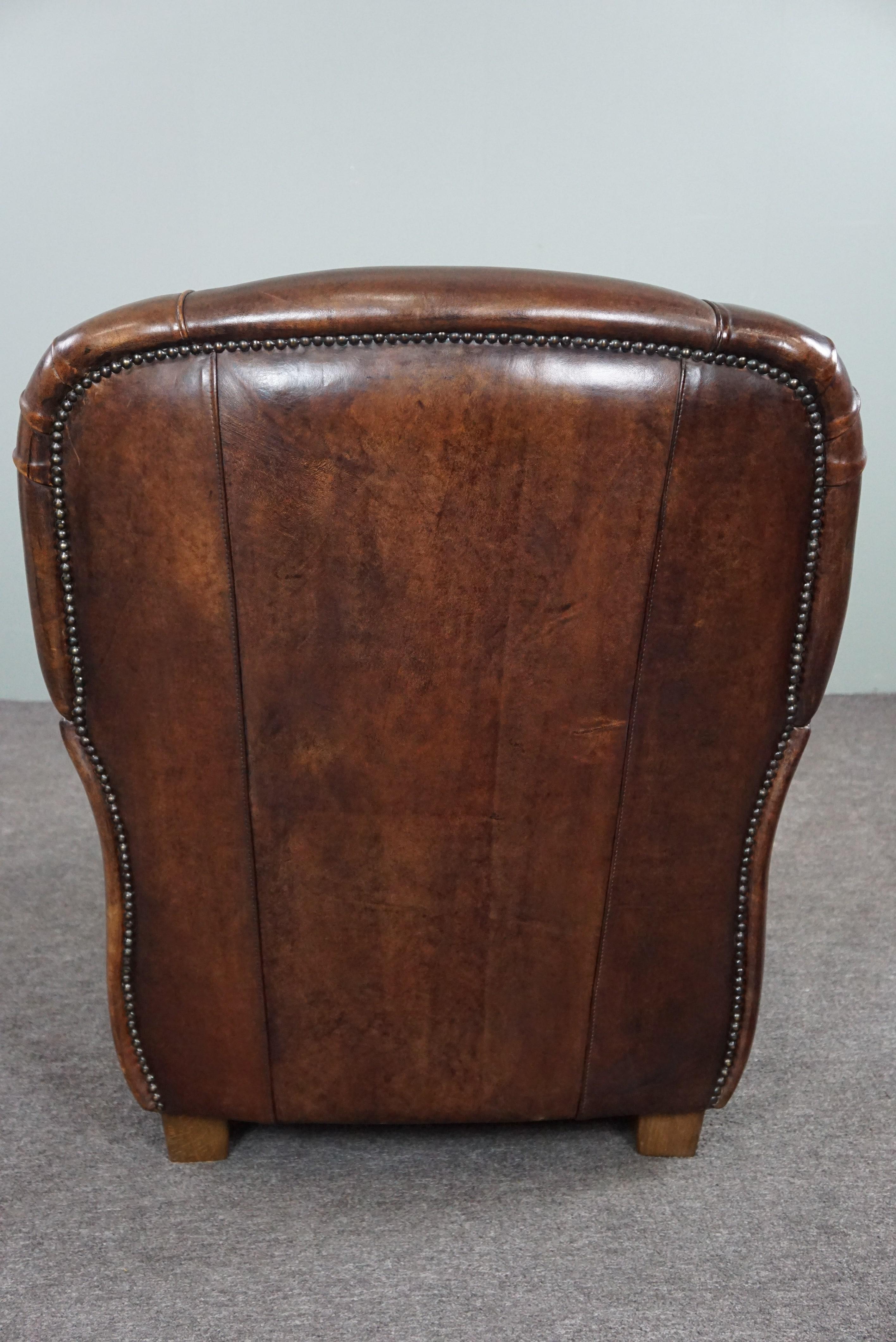 Hand-Crafted Spacious and well-fitting sheepskin armchair For Sale