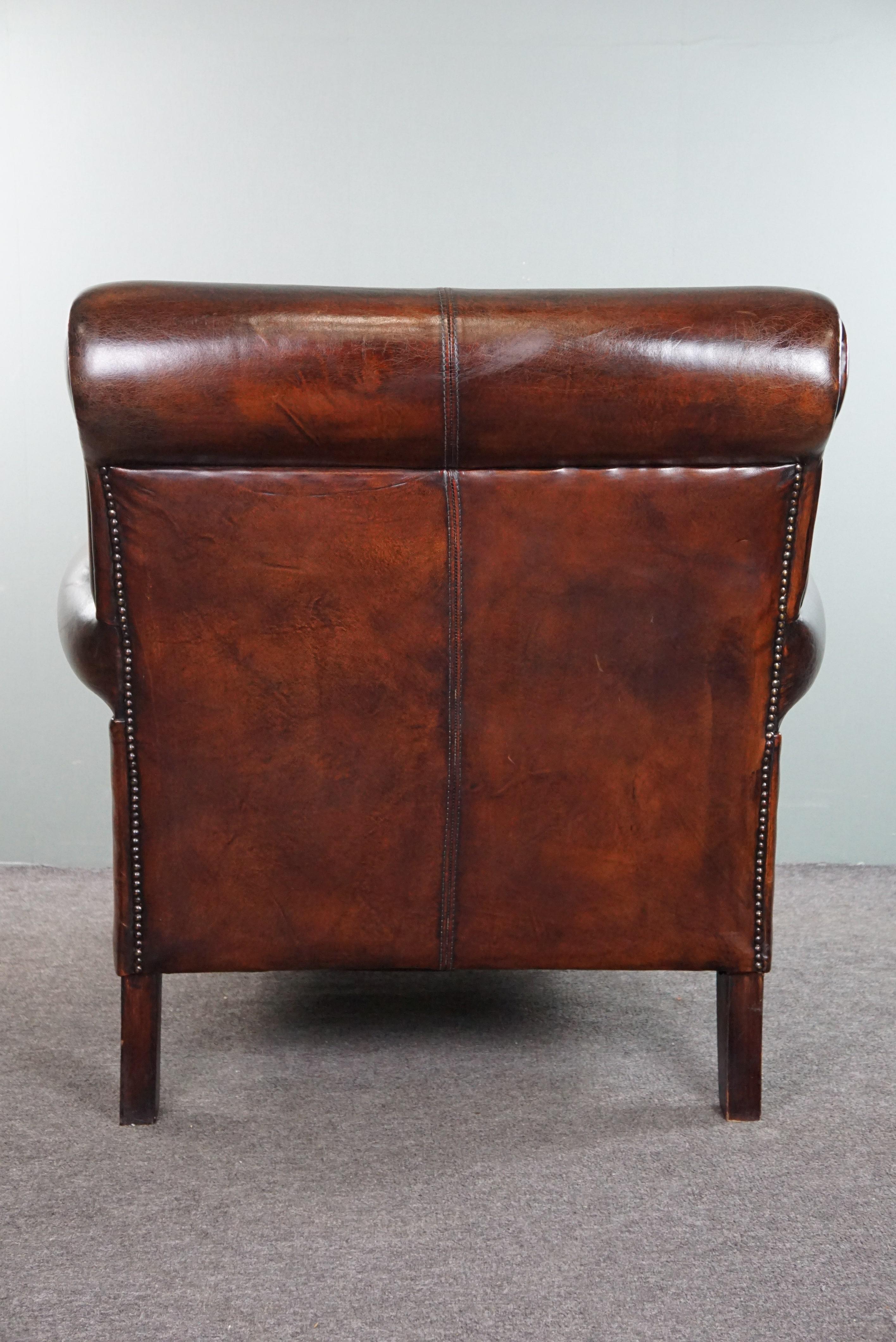 Late 20th Century Spacious sheepskin armchair with a relaxed deep seat For Sale