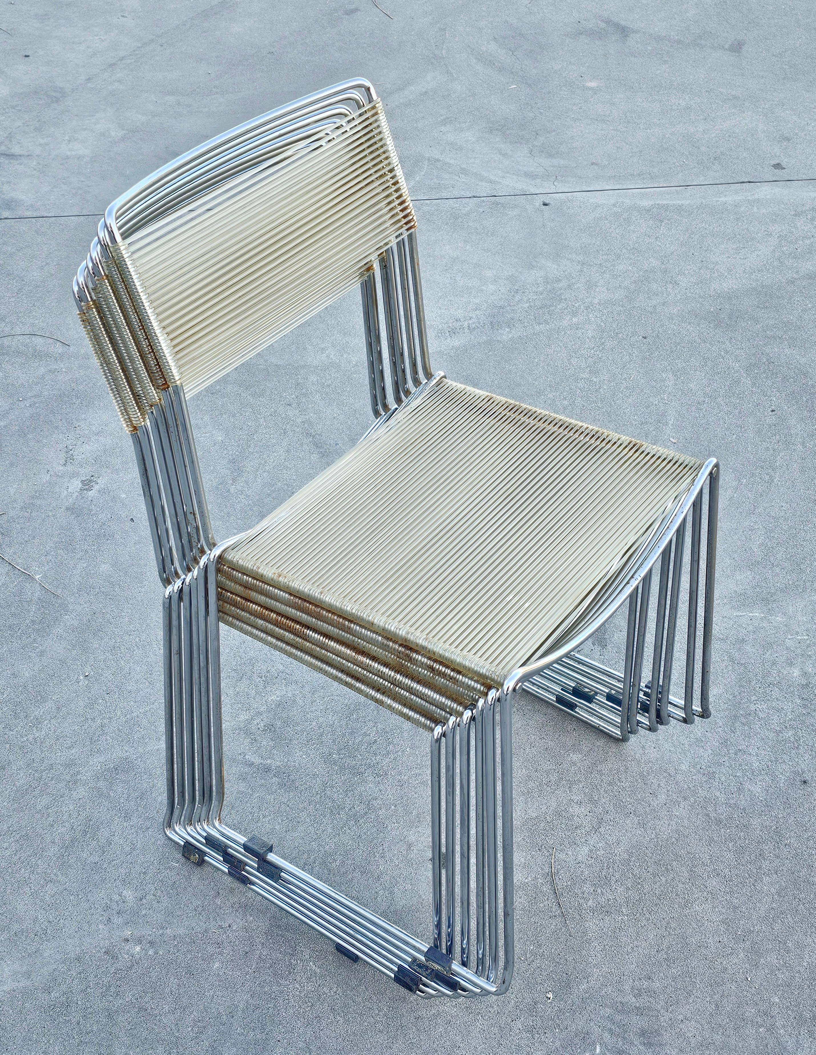 In this listing you will find a set of 6 postmoderen dining chairs called Spaghetti chairs, due to their PVC threaded seats and backrests. The chairs were designed by Giandomenico Belotti for Alias in 1970s.

Chairs are in good vintage condition