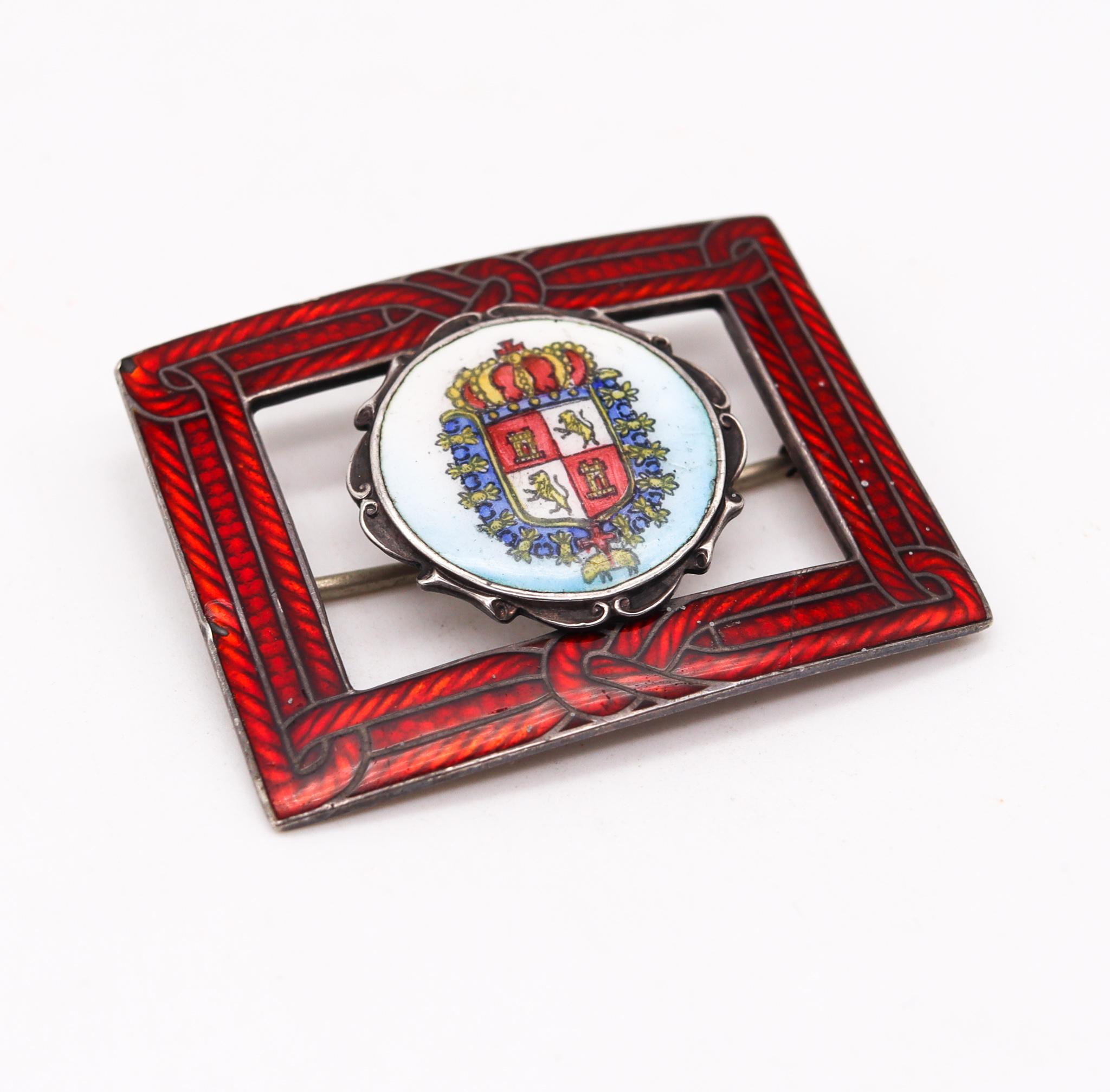 Patriotic Monarchy brooch with Spanish royal coat of arms.

Colorful piece depicting the Spanish royal coat of arms, created between the 1880 and the 1912. This pro monarchic brooch has been crafted in solid .925/.999 sterling silver and decorated