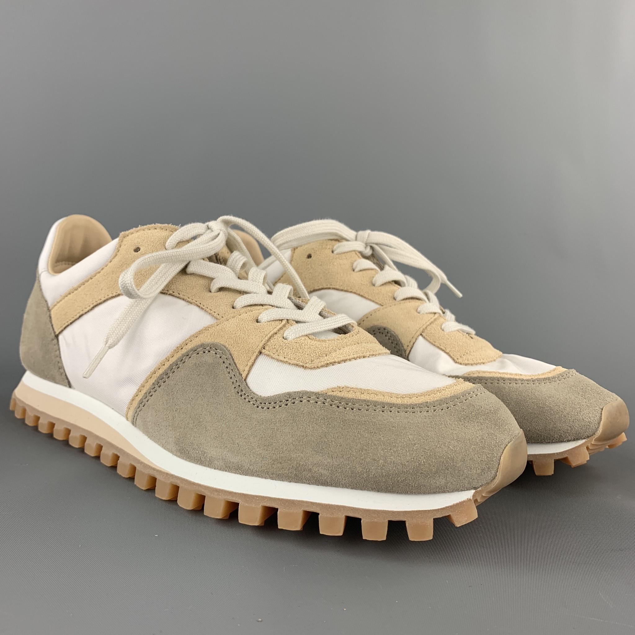 SPALWART sneakers comes in a white & beige mixed material nylon featuring a rubber sole and a lace up closure.

Very Good Pre-Owned Condition.
Marked: 42

Outsole:

11 in. x 4 in. 