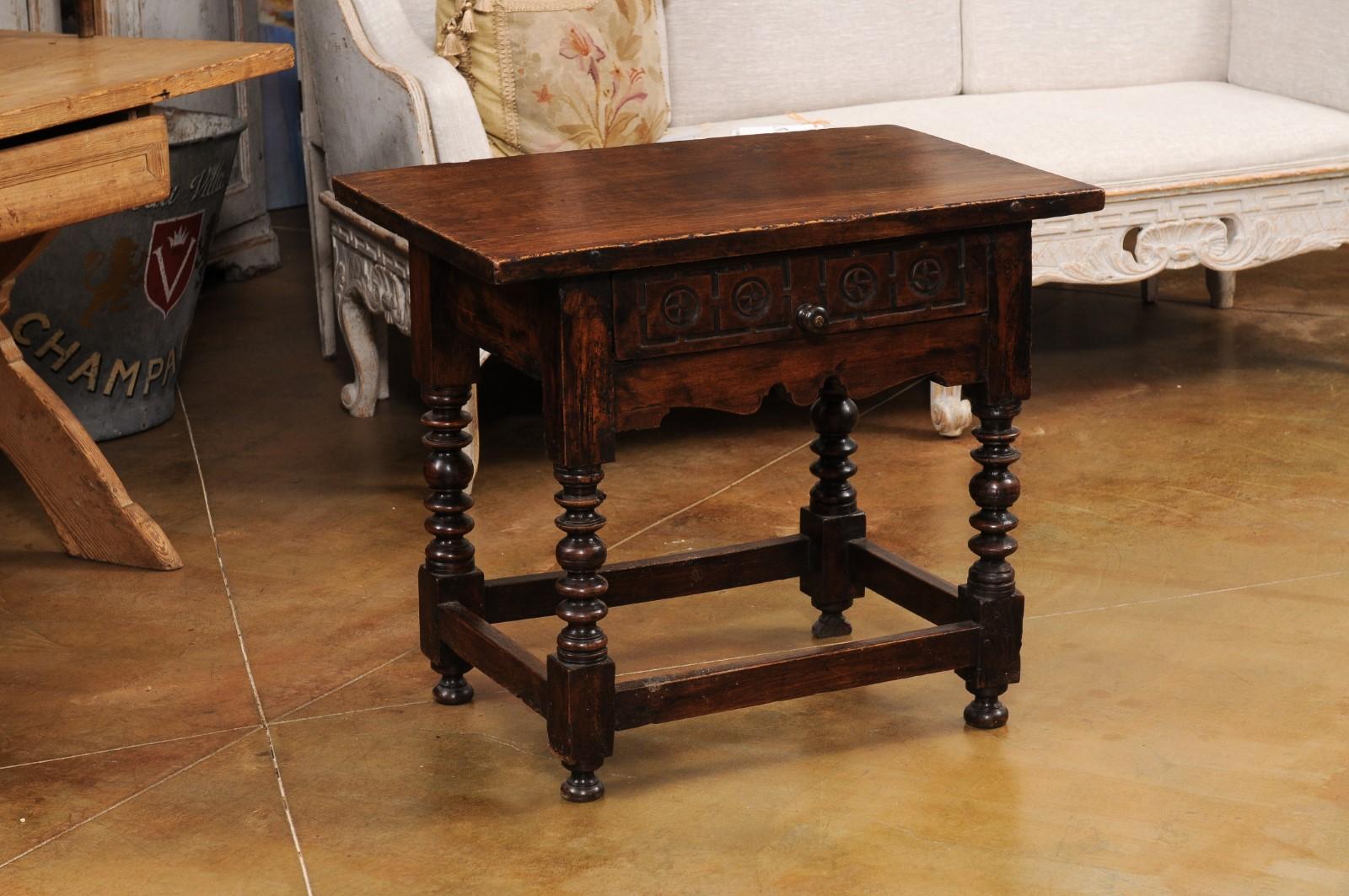 Spanish 1770s Walnut Side Table with Spool Legs and Rosettes Carved Drawer In Good Condition For Sale In Atlanta, GA