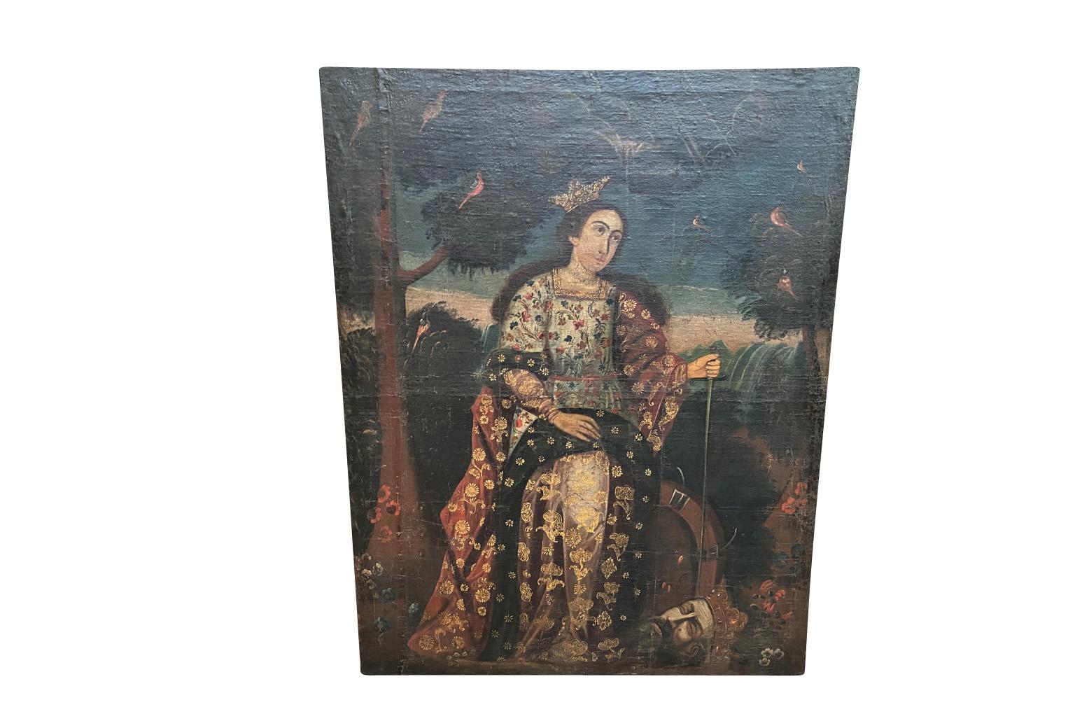 An outstanding 17th century Oil Painting of Catherine of Alexandria, a Christian saint and virgin, martyred in the early fourth century by the emperor Maxentius.  Catherine was both a princess and a  scholar who became a Christian around the age of