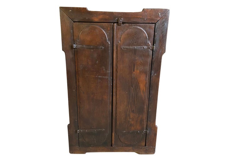 A very handsome 17th century primitive armoire from the Catalan region of Spain. Soundly constructed from thick planks of chestnut. Stunning patina - very luminous. A fabulous storage piece lending charm to its surroundings.