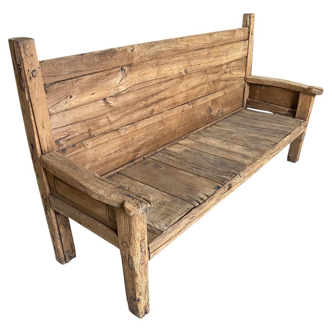 A very handsome later 17th century rustic bench from the Catalan region of Spain.  Soundly constructed in naturally washed chestnut and oak.  Perfect for any primitive or modern interior.  Seat height is 15