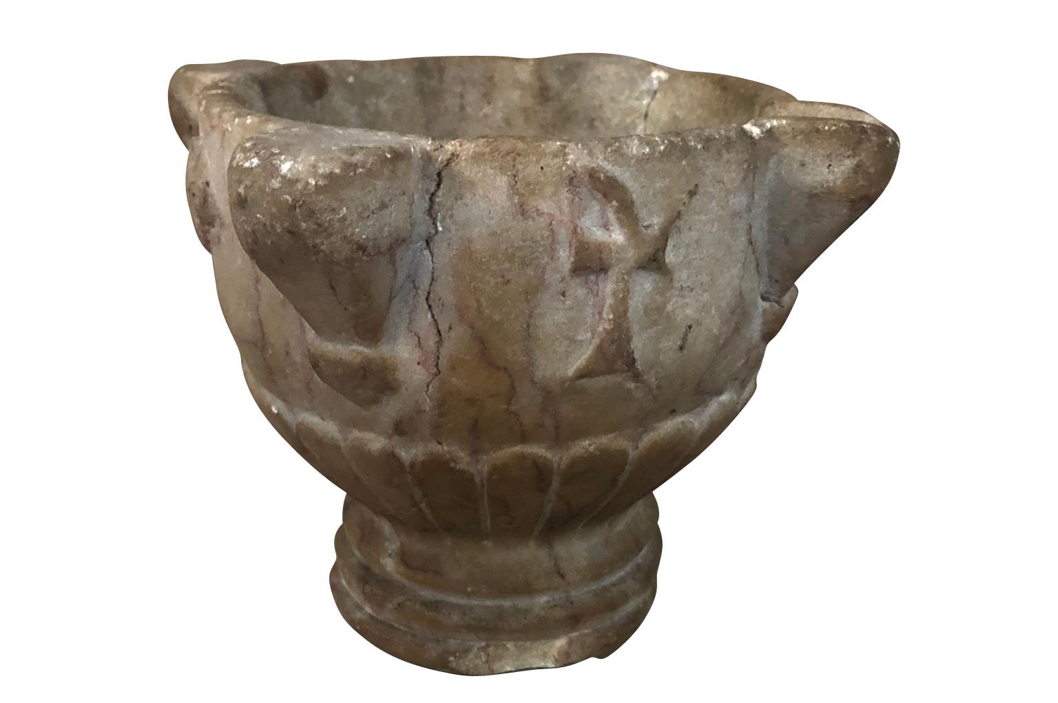 A very lovely 17th century mortar carved from marble from Tarragona, Spain. Excellent patina. A wonderful object for any tabletop of bookcase display.