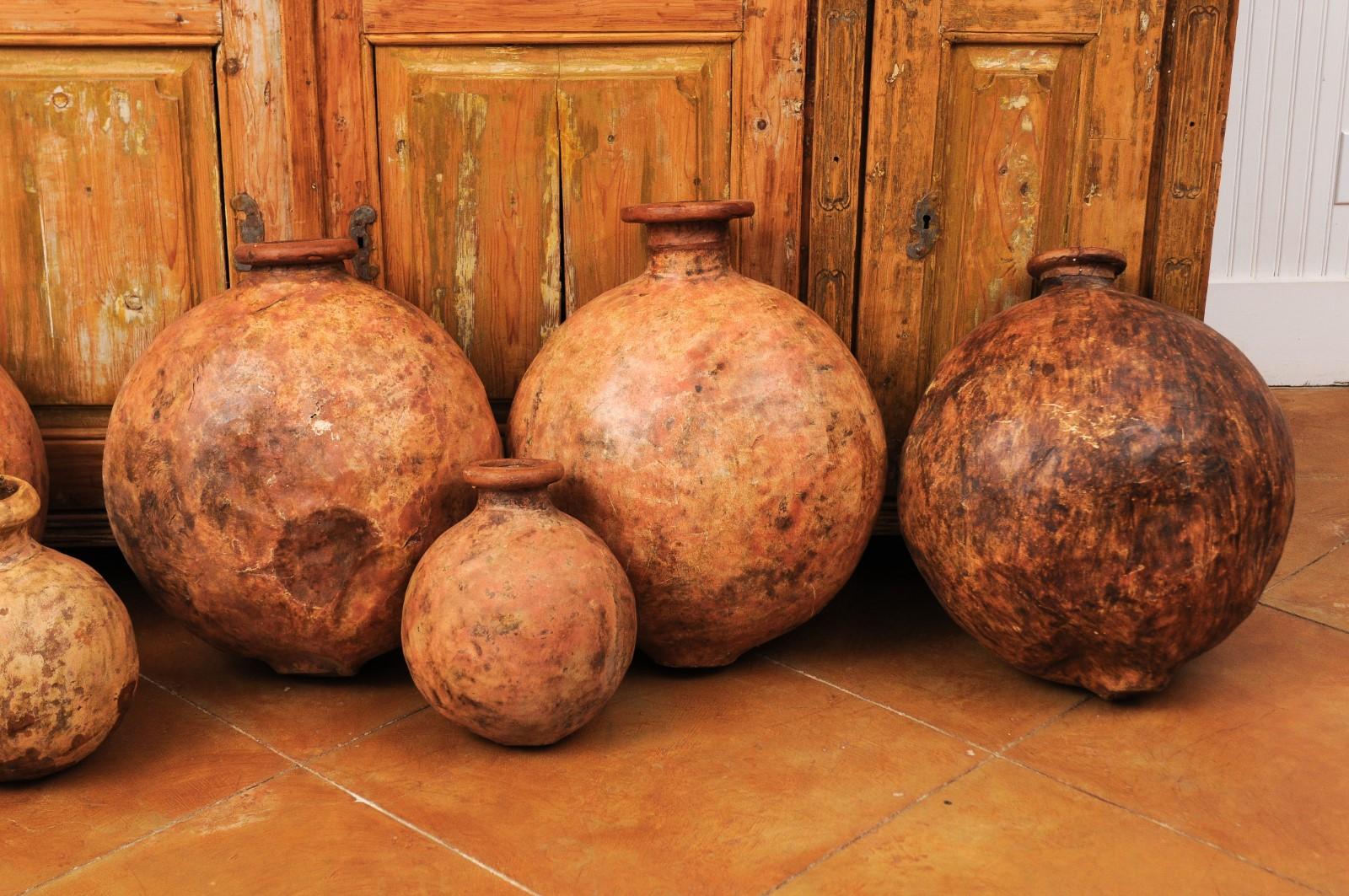 Spanish 1830s Rustic Wine or Olive Oil Jugs with Distressed Patina, Sold Each In Good Condition For Sale In Atlanta, GA