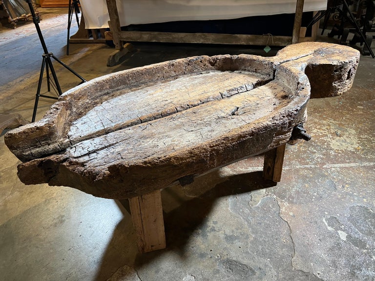 An exceptional and grand scale Cheese Making Board from the Catalan region of Spain - now as a table basse - coffee table. Soundly constructed from 2 very thick planks of naturally washed Meleze - held togther by massive iron rods and bolts. Meleze