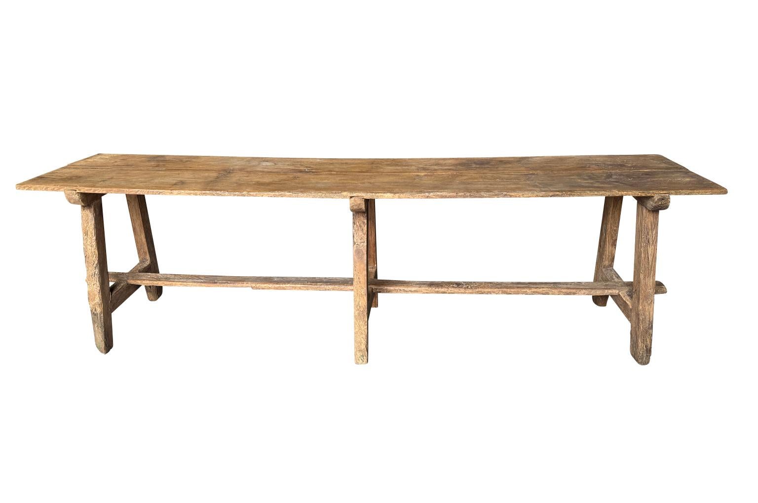 A wonderful 18th century Console Table from the Catalan region of Spain. Beautifully constructed from naturally washed pine with 3 sets of slightly splayed legs. Super patina. 