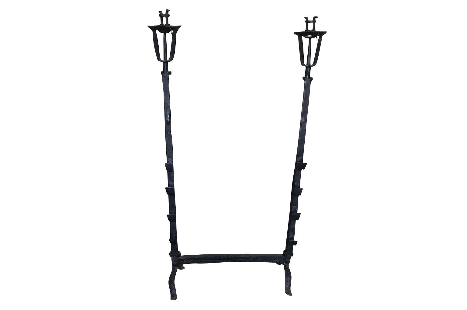 A very attractive 18th century fireplace fitment handsomely constructed from hand forged iron. Fireplace fitments such as this one were used in the large walk in kitchen fireplaces and used for cooking.