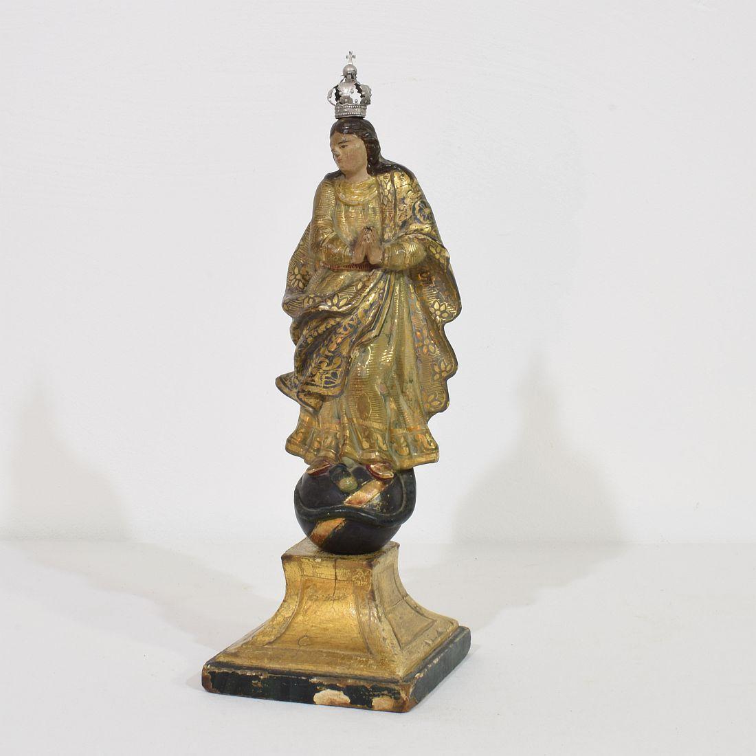 Wonderful wooden Madonna/Santos with silver(ed) crown. Beautiful gilding /color and great expression.
Spain, circa 1750. Weathered, small losses.
More photo's available on request.