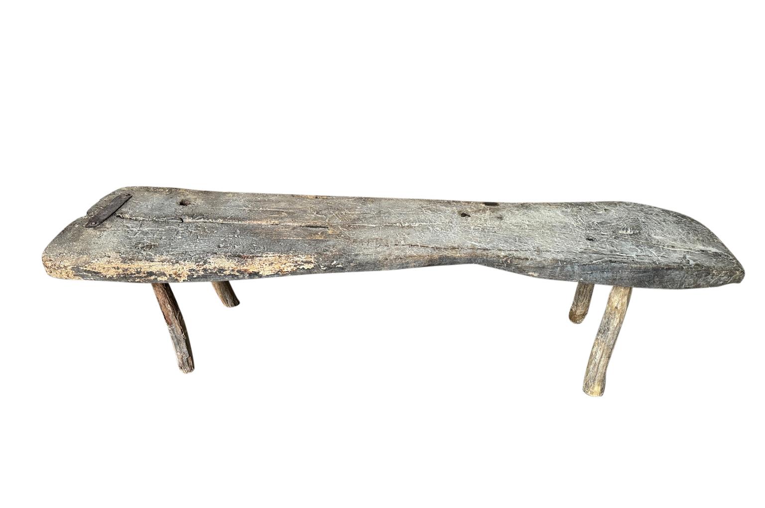 A charming 18th century Bench from the Catalan region of Spain. Soundly constructed from naturally washed chestnut. Super patina. Perfect at the base of a bed, or as a coffee table. 