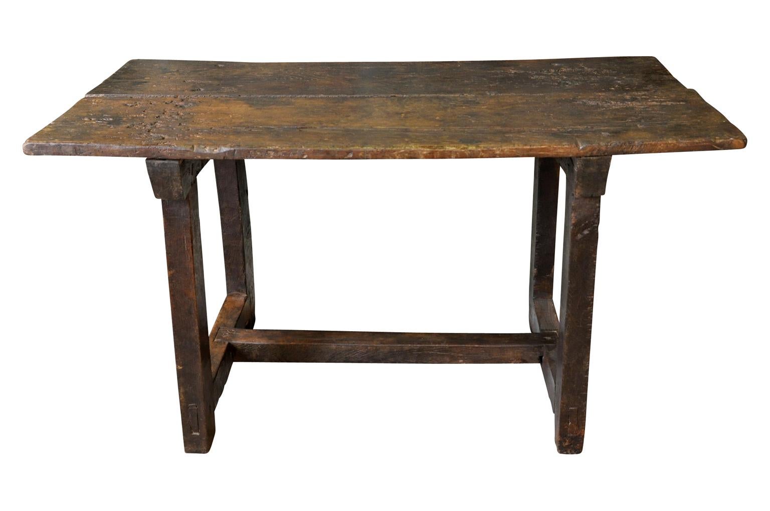 A very handsome later 18th century primitive side table from the Catalan region of Spain. Soundly constructed from chestnut with very Minimalist lines. Wonderful patina. Perfect as a bedside table.