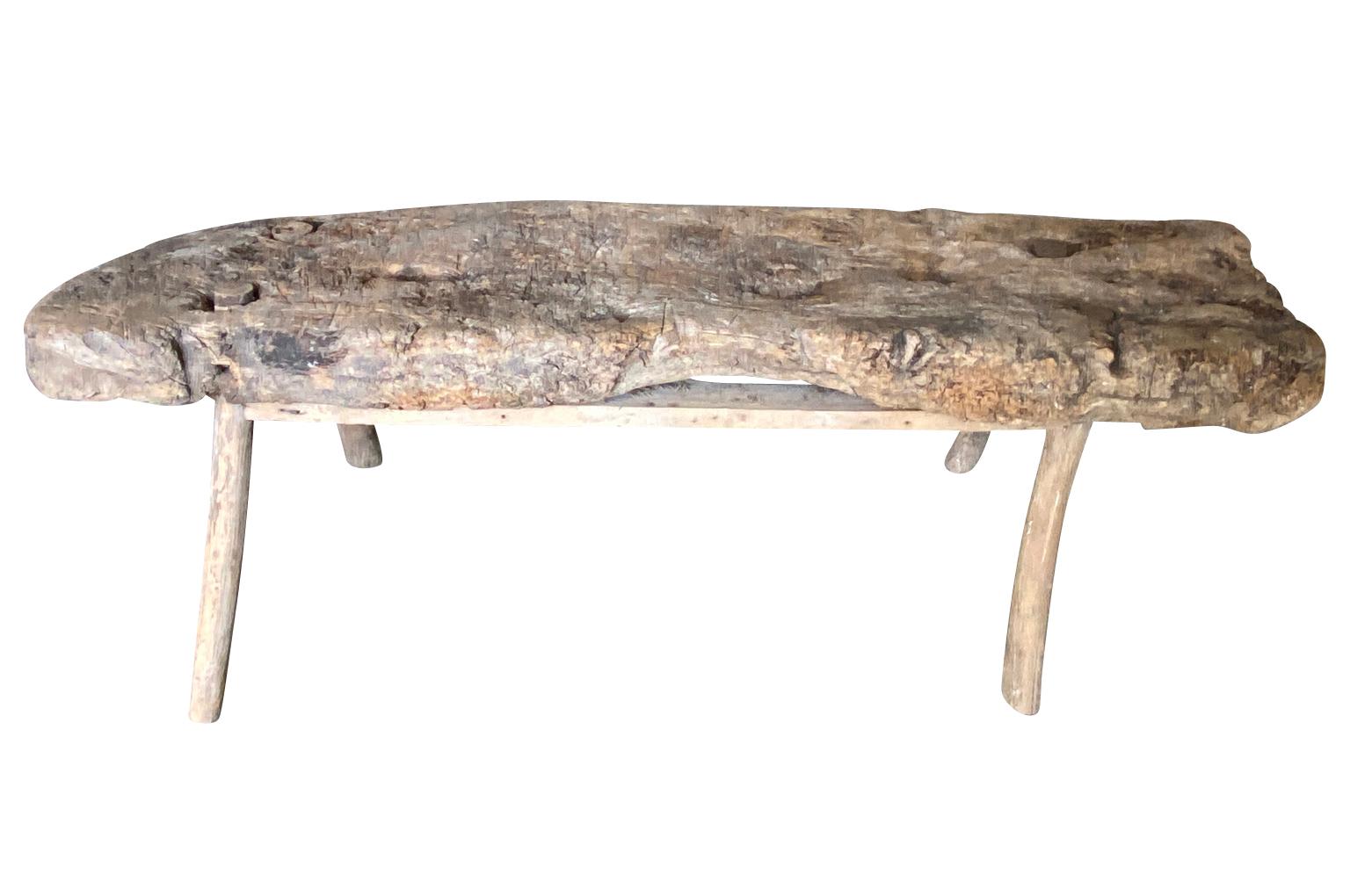 A rustic 18th century Bench - Coffee Table from the Catalan region of Spain.  Soundly constructed from naturally washed oak with a solid board top and wonderful organic shape.  Super patina and graining.
