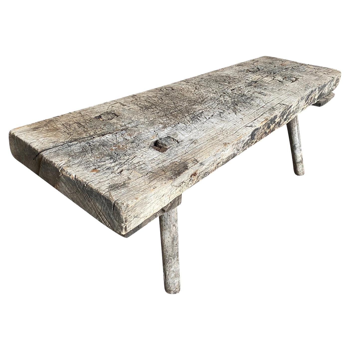 A primitive 18th century Bench - Coffee Table from the Catalan region of Spain.  Soundly constructed from naturally washed chestnut with a solid board top and slightly splayed legs.  Super patina and graining.