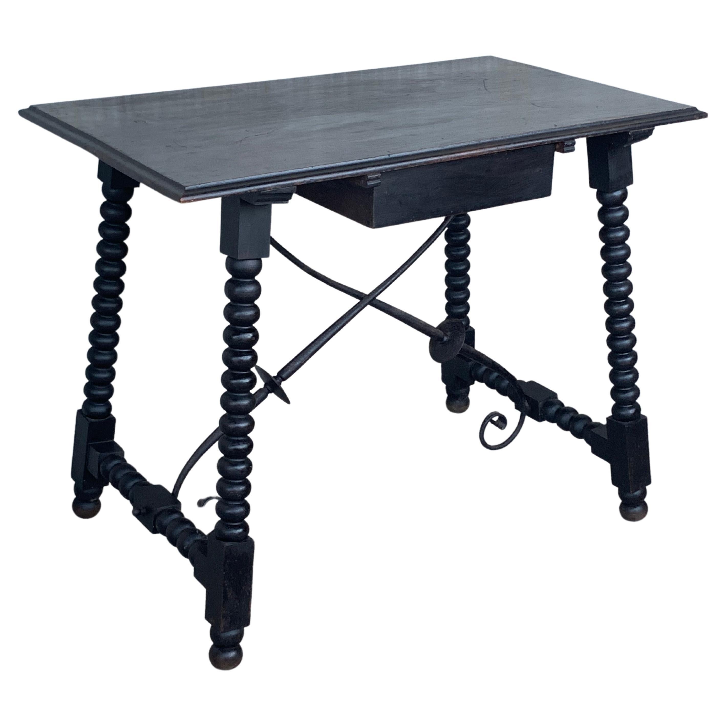 Spanish 1900s Walnut Side Table with Single Drawer and Iron Stretcher For Sale