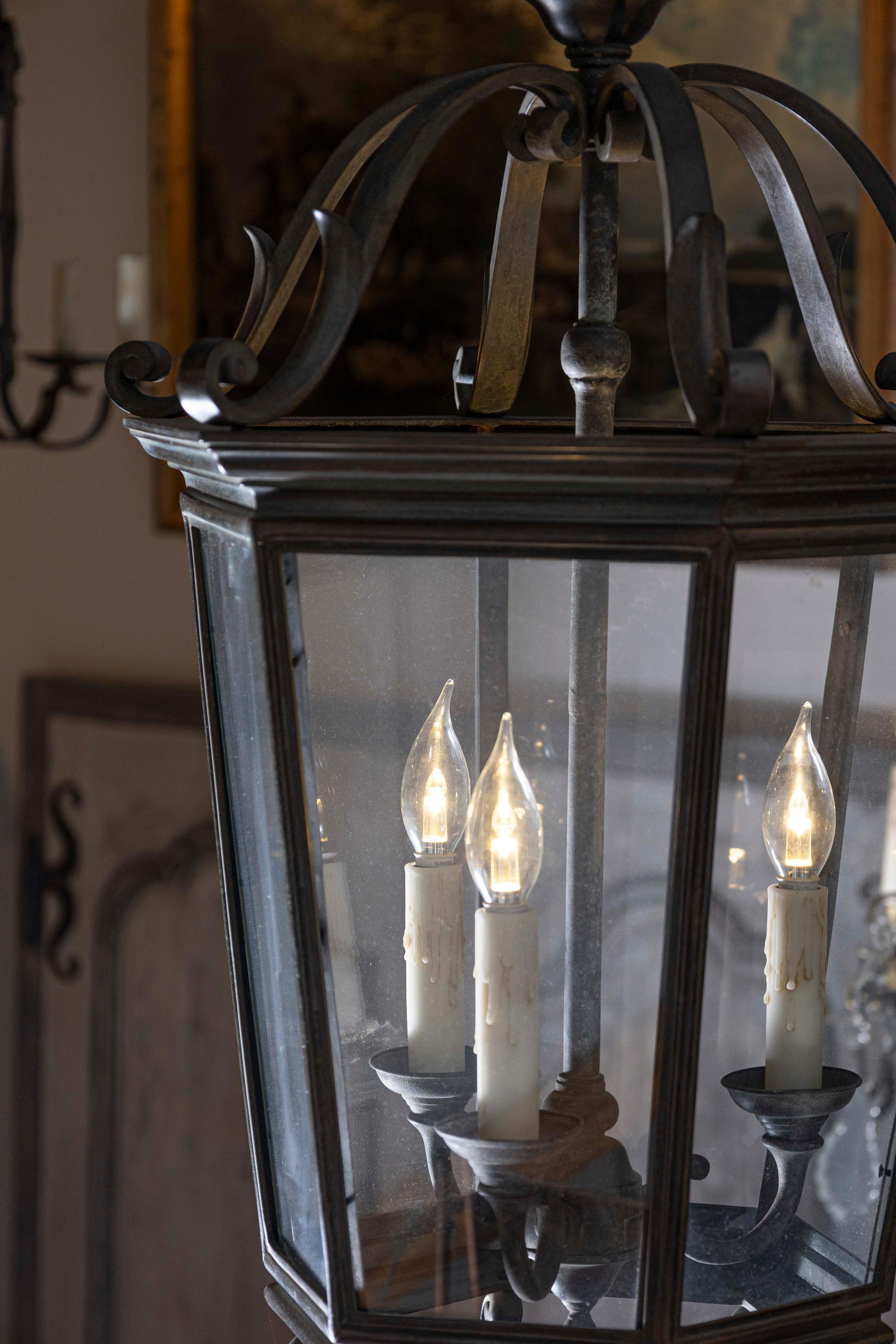 20th Century Spanish 1910s Bronze and Glass Hexagonal Lantern with Three Lights and Volutes For Sale