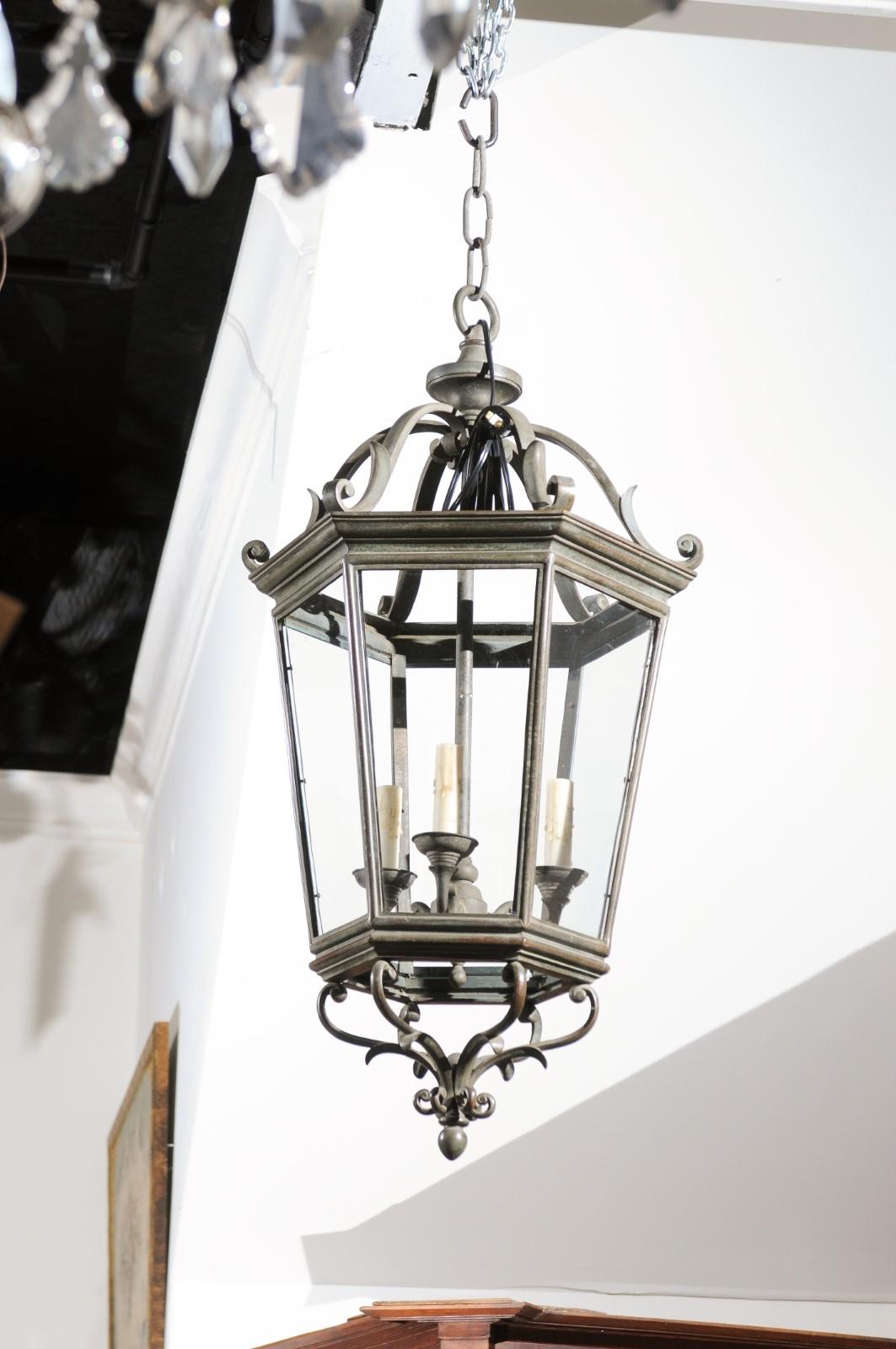 Spanish 1910s Bronze and Glass Hexagonal Lantern with Three Lights and Volutes For Sale 1