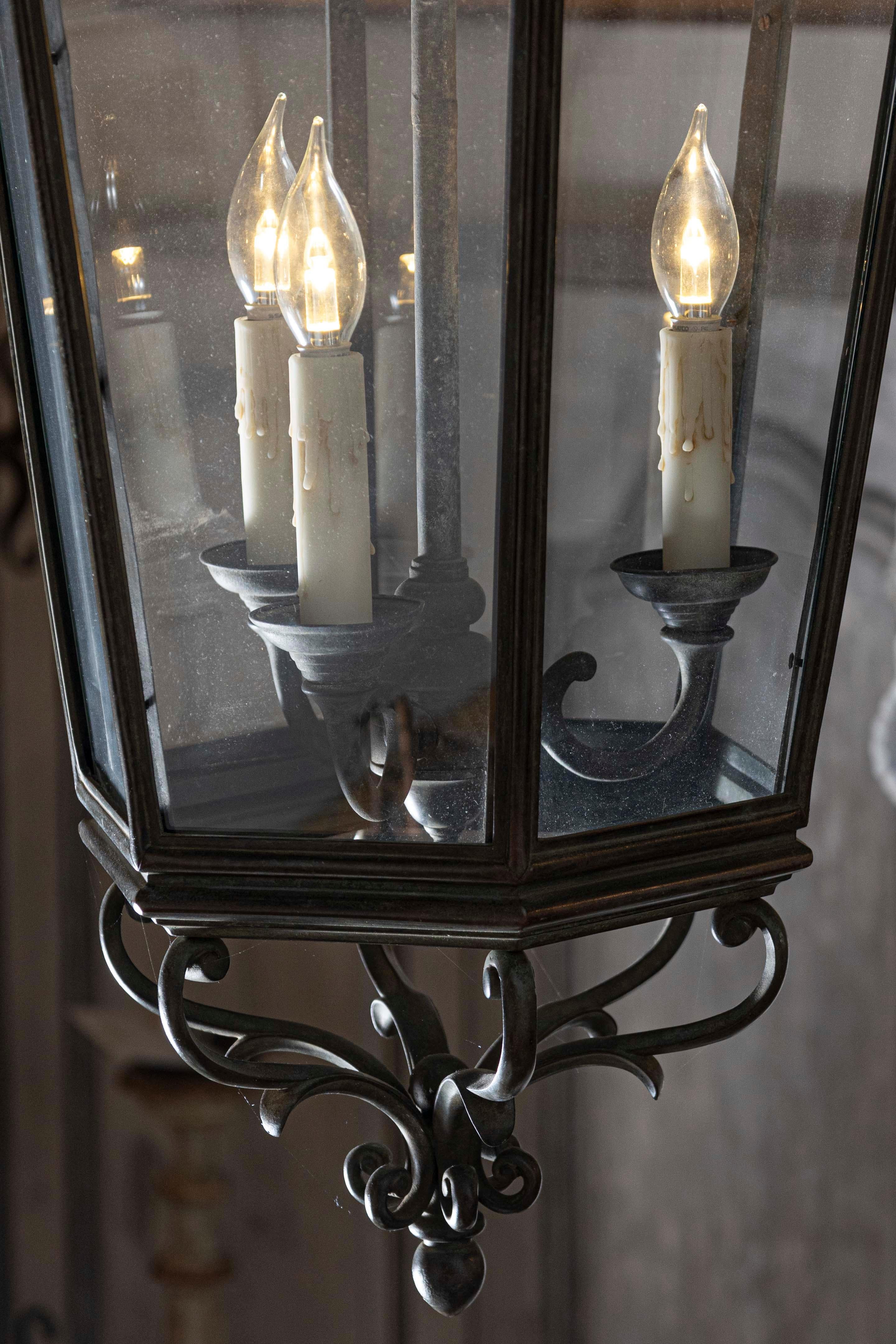 Spanish 1910s Bronze and Glass Hexagonal Lantern with Three Lights and Volutes For Sale 1