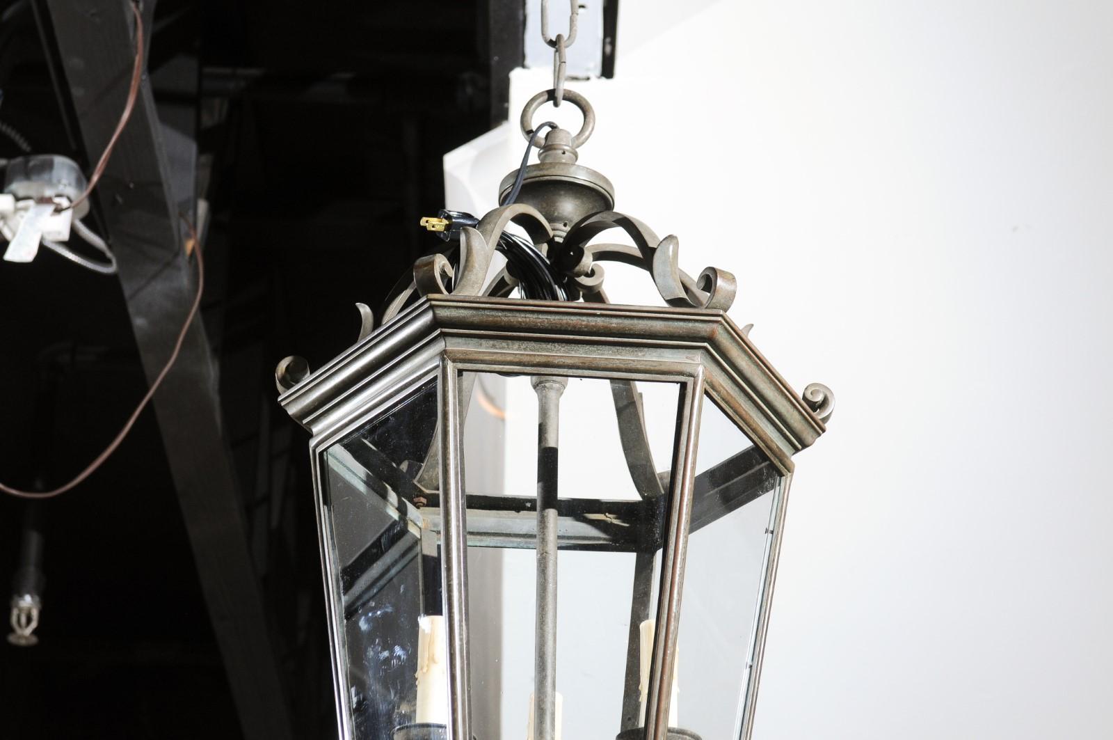 Spanish 1910s Bronze and Glass Hexagonal Lantern with Three Lights and Volutes For Sale 4