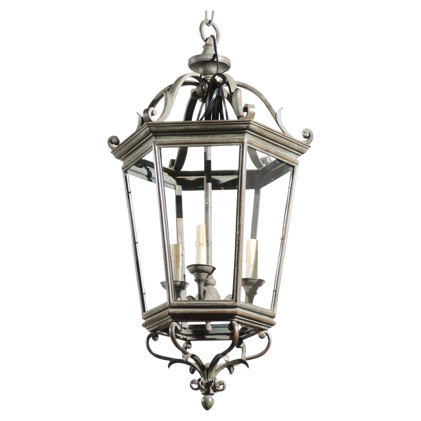 Spanish 1910s Bronze and Glass Hexagonal Lantern with Three Lights and Volutes For Sale
