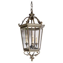 Spanish 1910s Bronze and Glass Hexagonal Lantern with Three Lights and Volutes