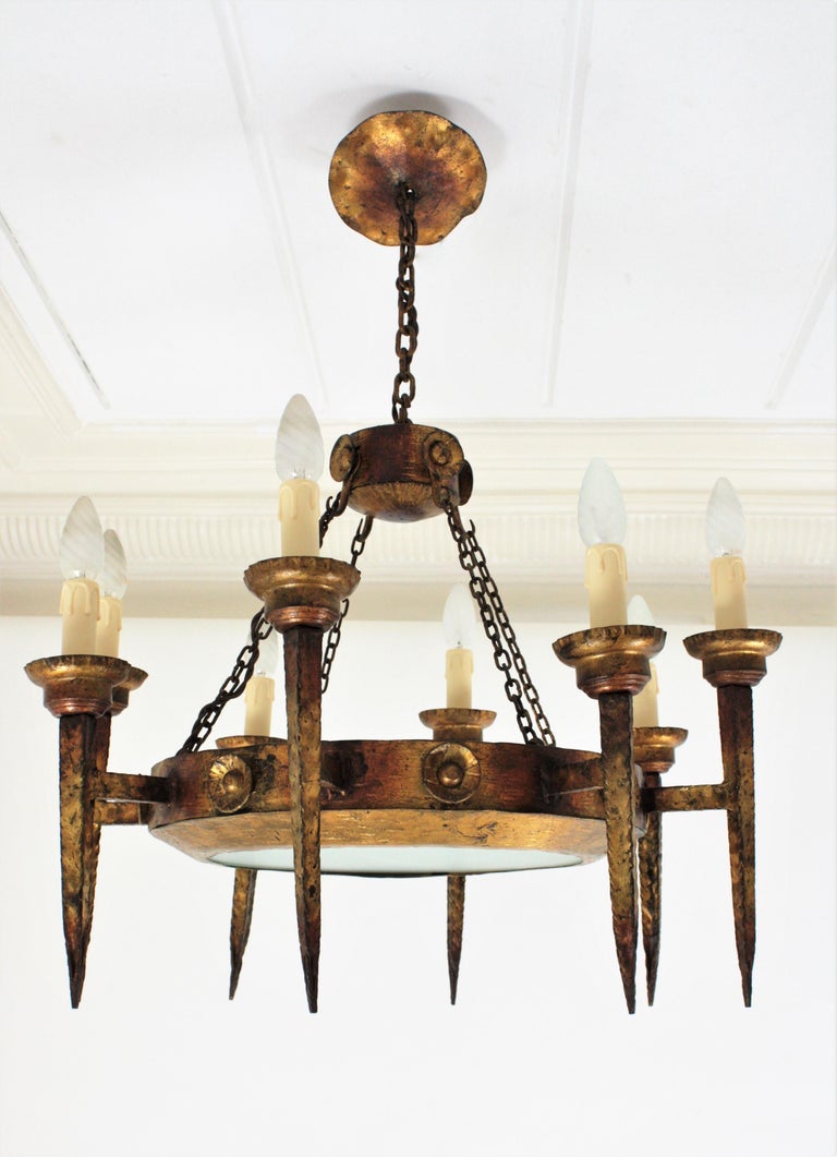 Spanish Ring Torch Chandelier in Gilt Wrought Iron For Sale at 1stDibs large wrought iron