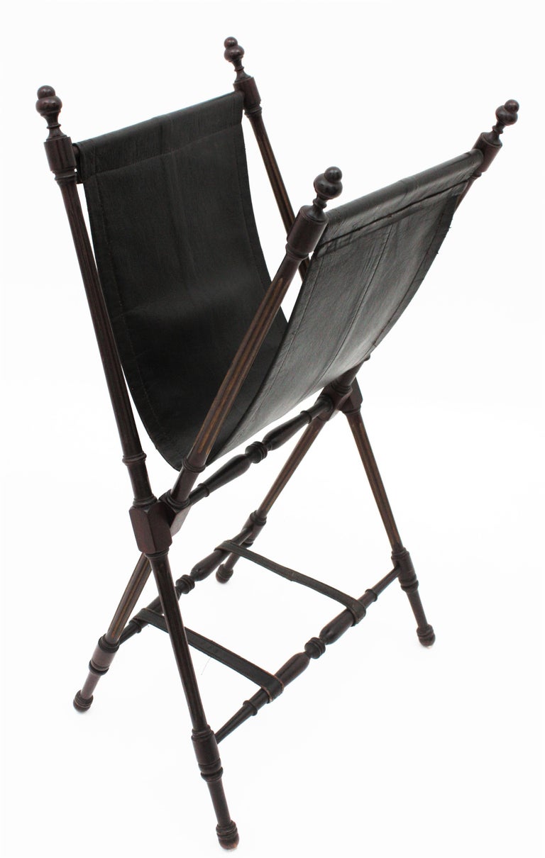 Spanish Folding Magazine Rack, Turned Wood and Black Leather For Sale