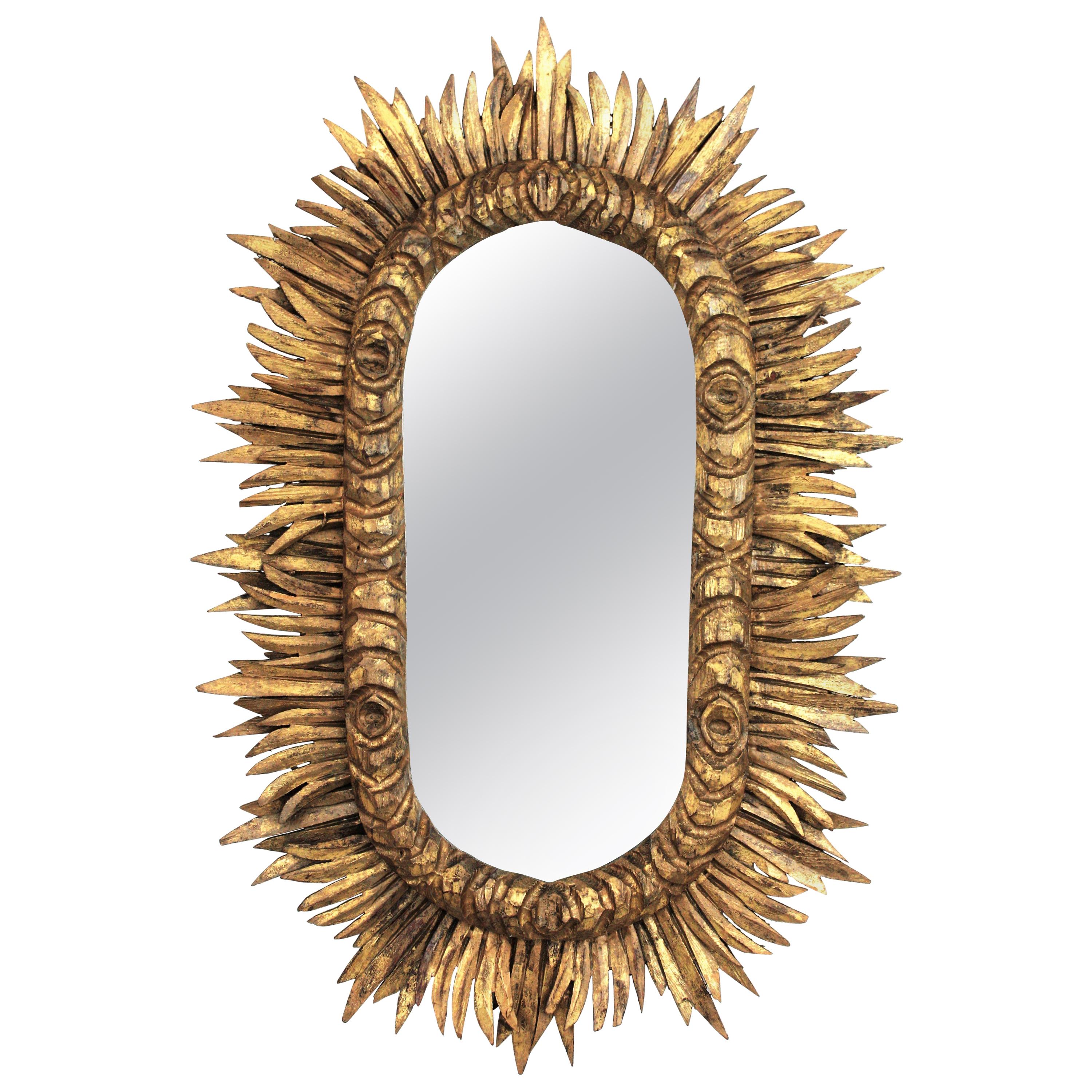 Spanish 1930s Baroque Style Carved Giltwood Oval Shaped Sunburst Mirror