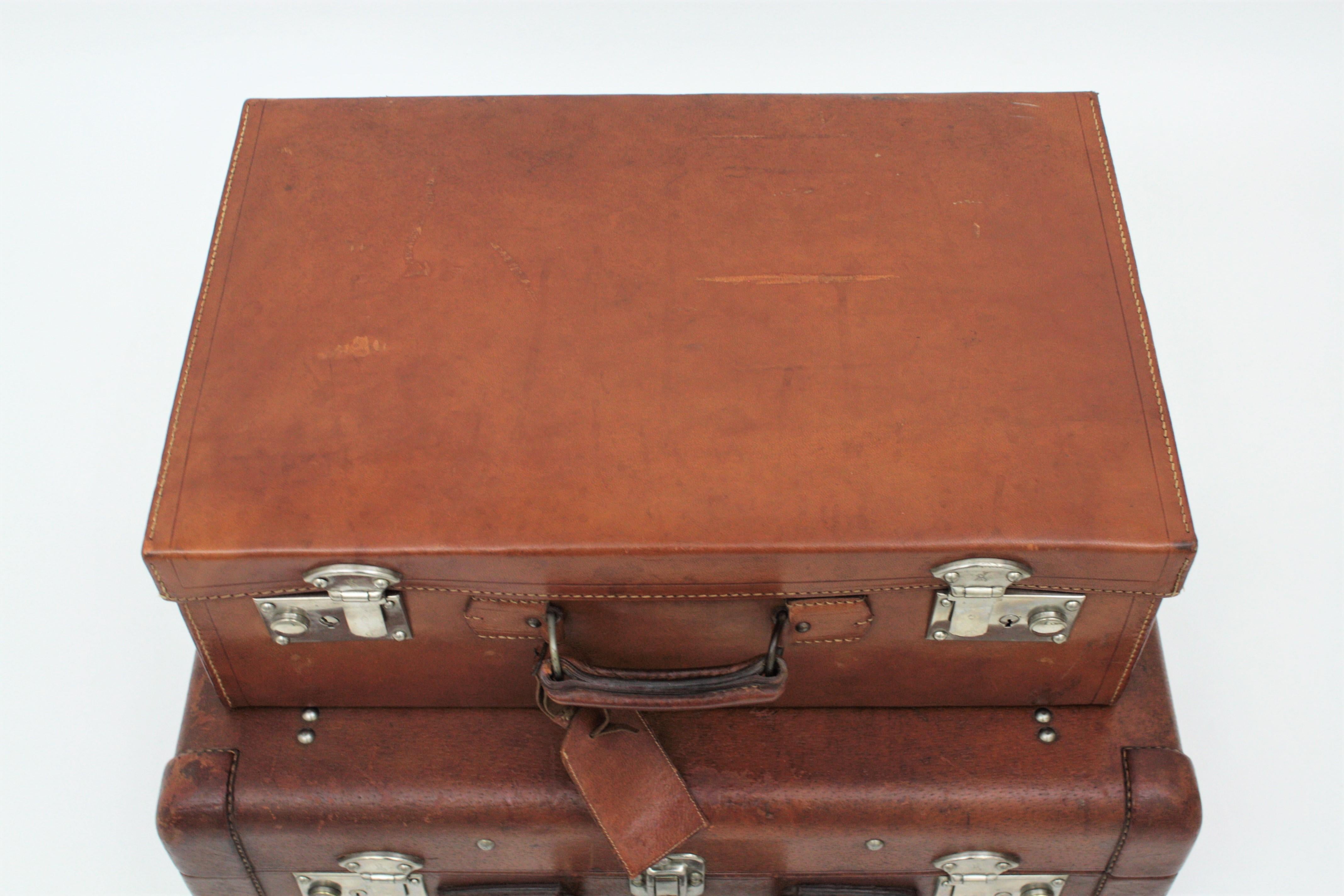 Metal Spanish Leather Suitcases as Side Table For Sale