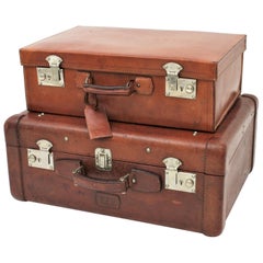 Used Spanish Leather Suitcases as Side Table