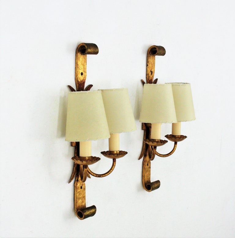 Pair of Spanish Revival Wall Sconces in Gilt Wrought Iron at 1stDibs