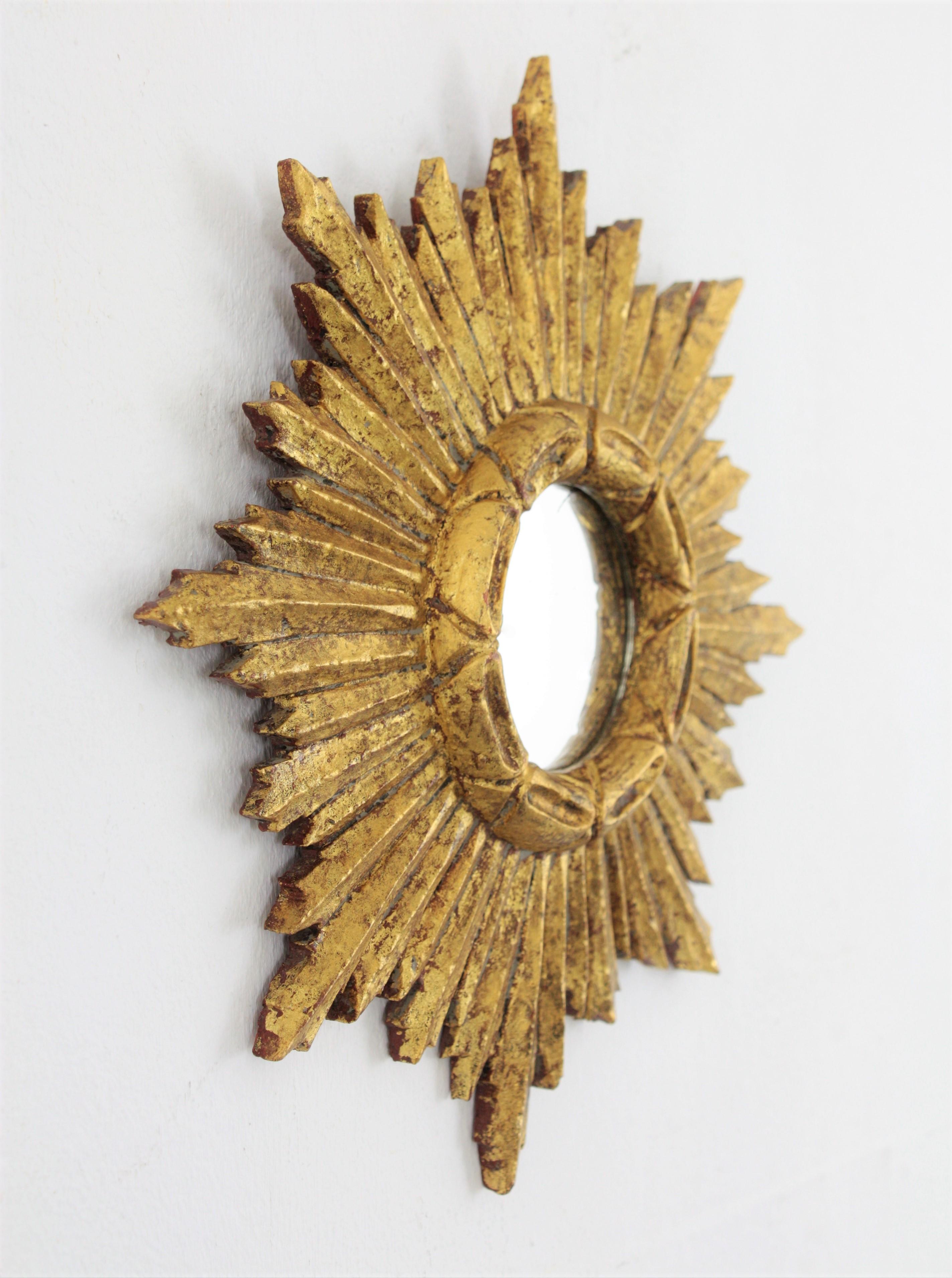 Mid-20th Century Spanish 1950s Baroque Style Carved Giltwood Mini Sunburst Mirror