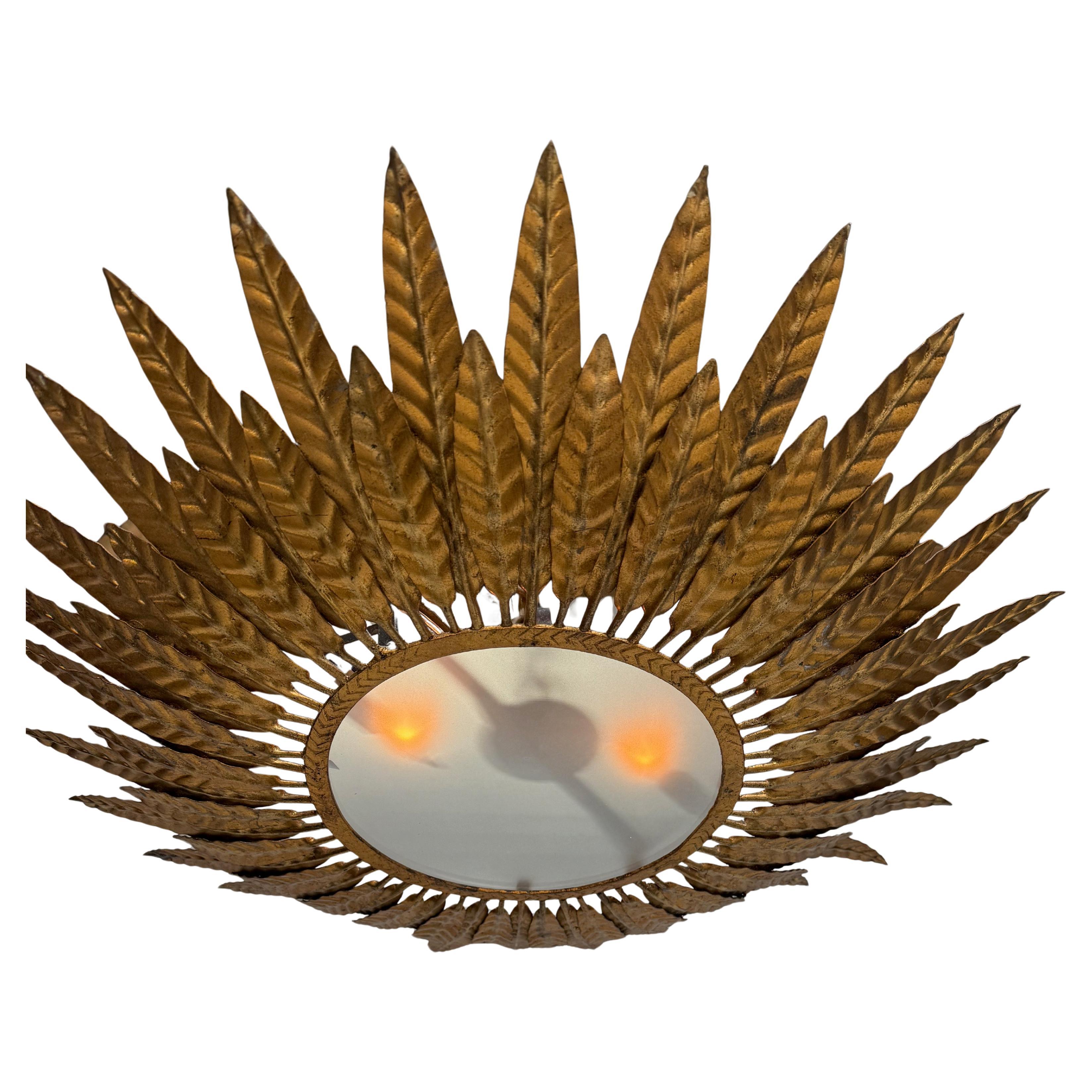 Spanish 1950
s Flush Mount Sunburst Ceiling Fixture For Sale