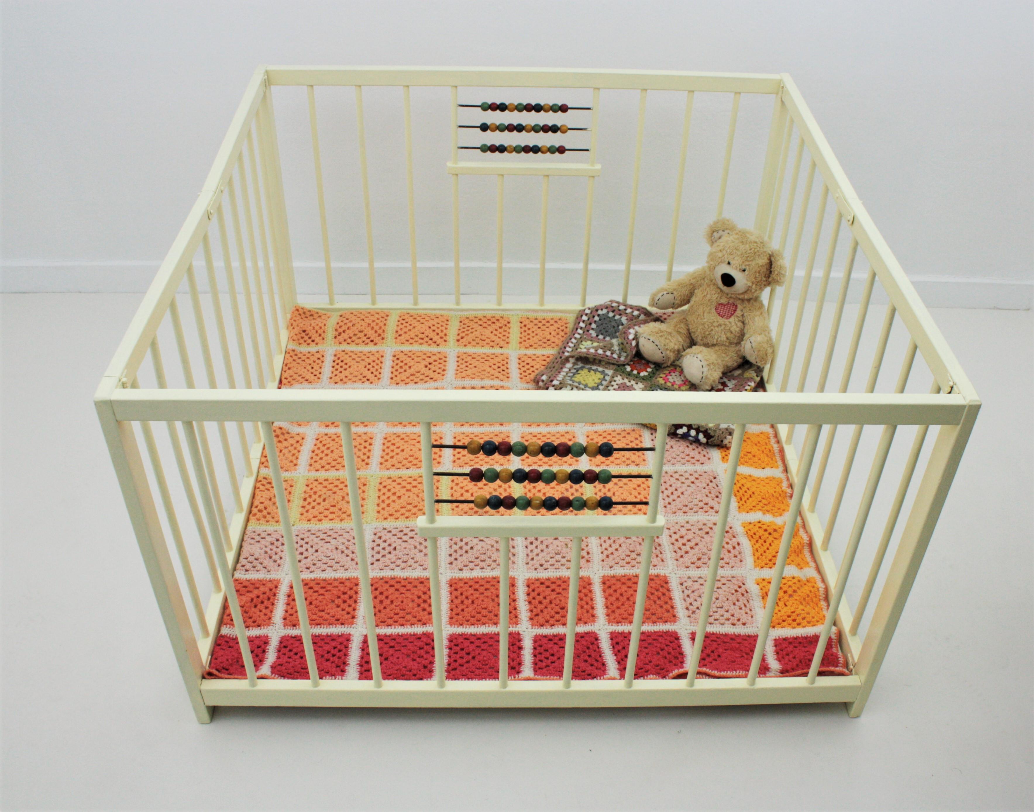 Painted Spanish 1950s Folding Wooden Childs Playpen with Beads Abacus Toy For Sale